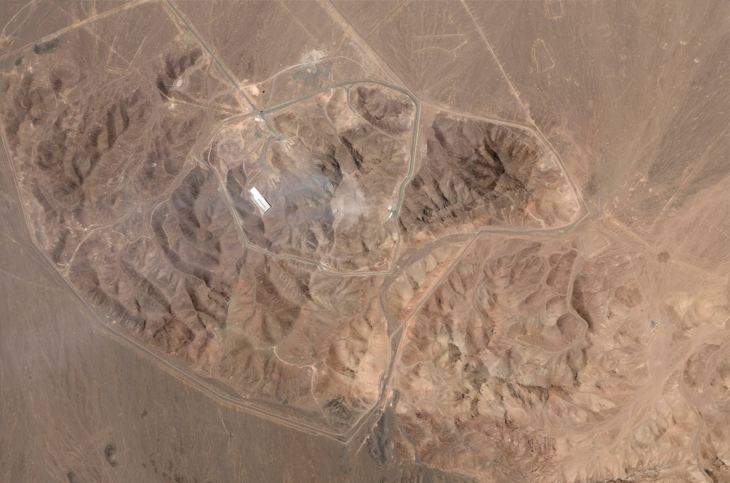 This satellite picture by Planet Labs PBC shows Iran's underground nuclear enrichment site at Fordo after a U.S. airstrike targeted the facility Sunday, June 22, 2025. (Planet Labs PBC via AP)