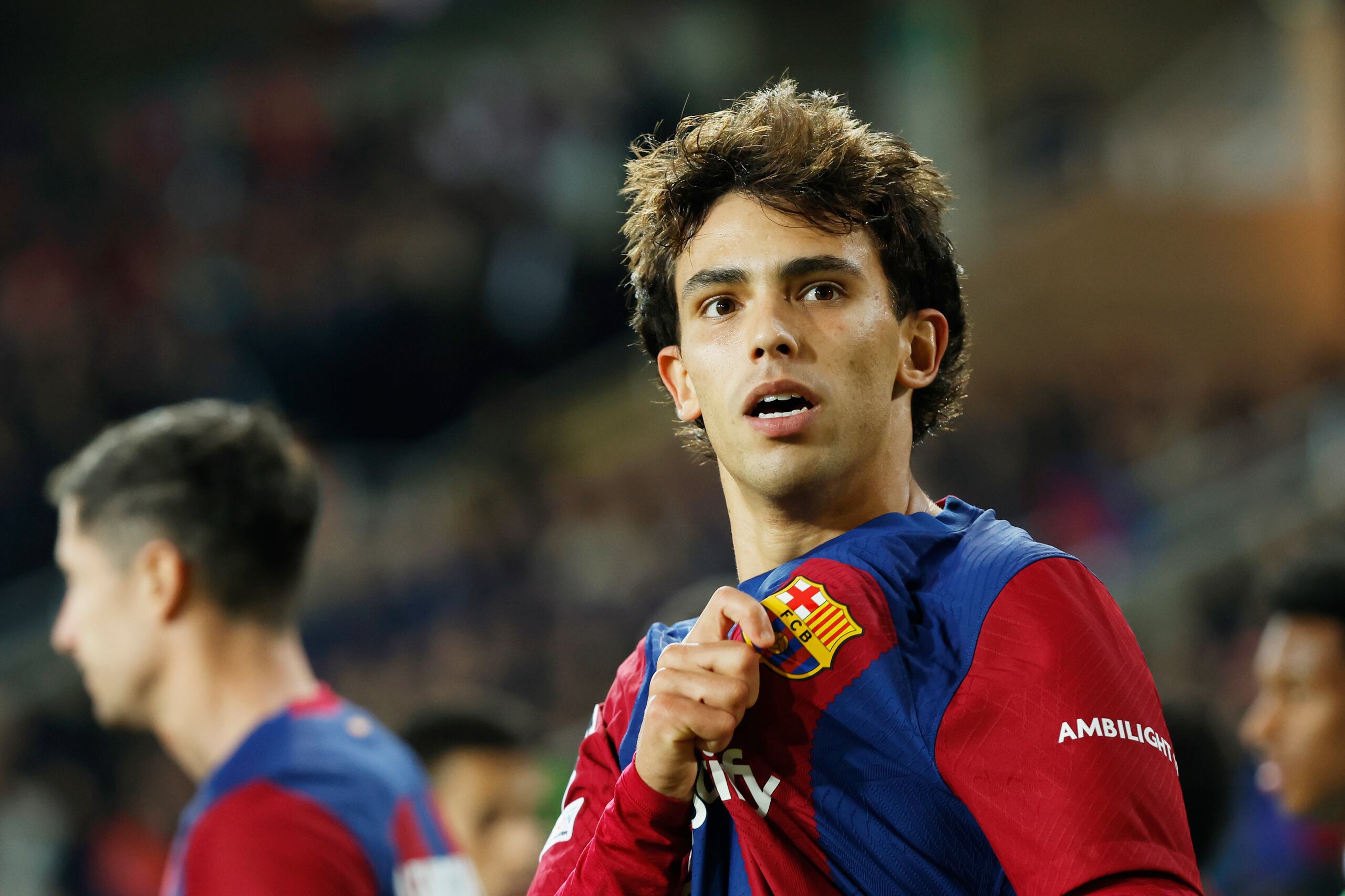 El portugués Joao Felix celebra tras anotar el segundo gol del Barcelona ante el Porto en el partido de la Champions.