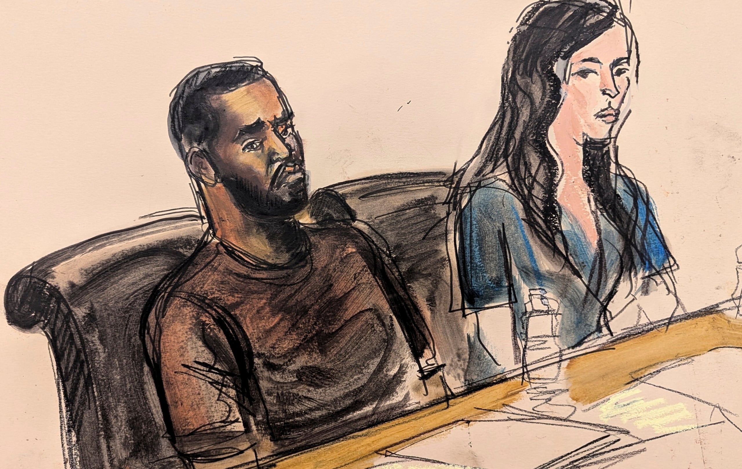 En este boceto de la sala del tribunal, Sean "Diddy" Combs, a la izquierda, se sienta en la mesa de la defensa junto a uno de sus abogados, Teny Garagos, durante su audiencia de fianza, el 18 de septiembre de 2024, en Nueva York.