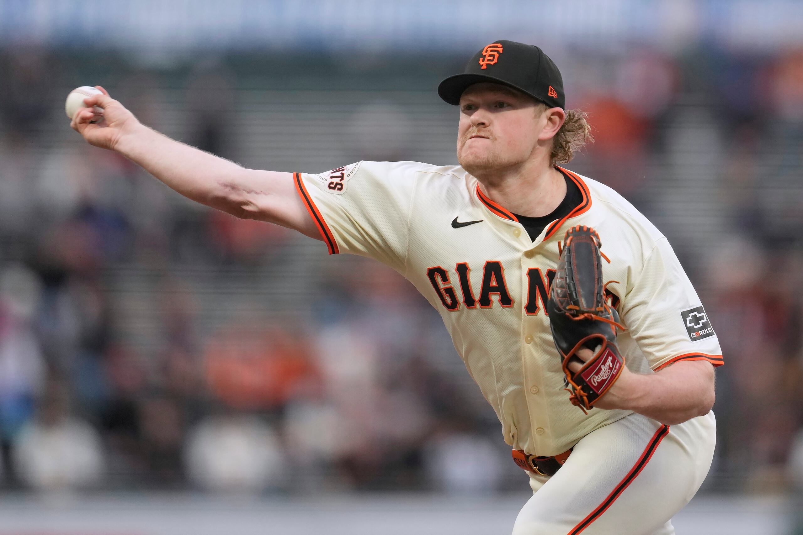 Logan Webb, pitcher de los Gigantes de San Francisco, hace un lanzamiento en el duelo del martes 23 de abril de 2024, ante los Mets de Nueva York (AP Foto/Jeff Chiu)