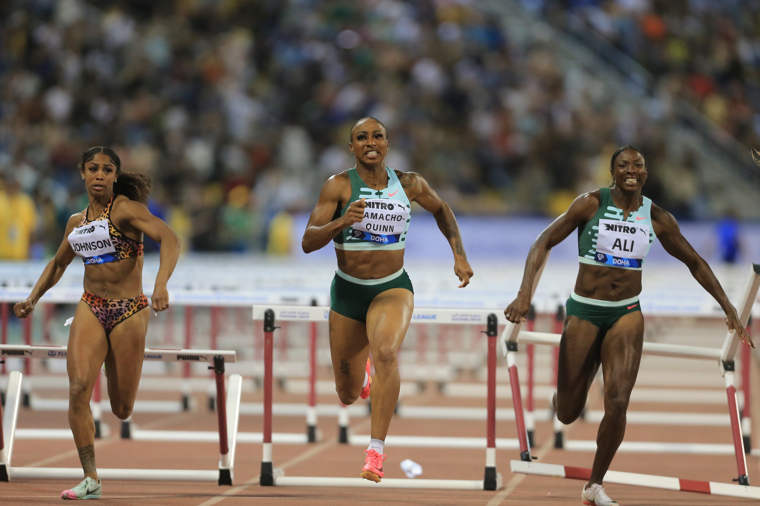 Camacho Quinn -en el centro- se prepara para competir el mes próximo en el Campeonato Mundial Budapest 2023.
