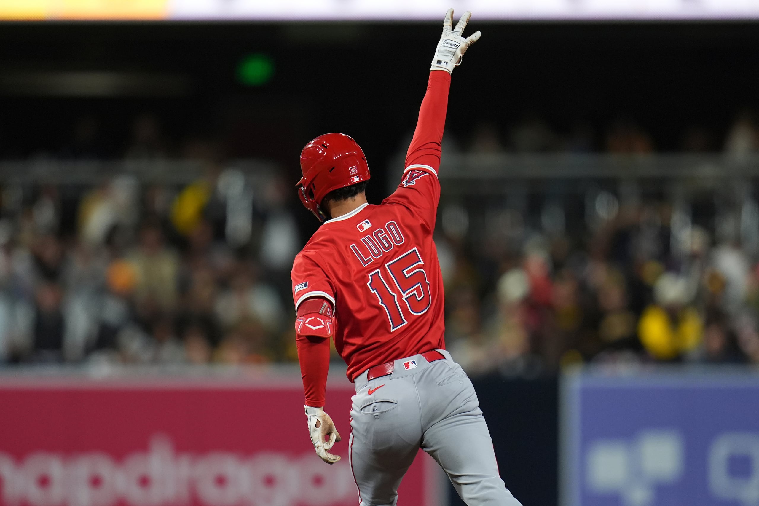 Los Angeles Angels' Matthew Lugo celebrates after hitting a two-run home run during the seventh inning of a baseball game against the San Diego Padres Tuesday, May 13, 2025, in San Diego. (AP Photo/Gregory Bull)