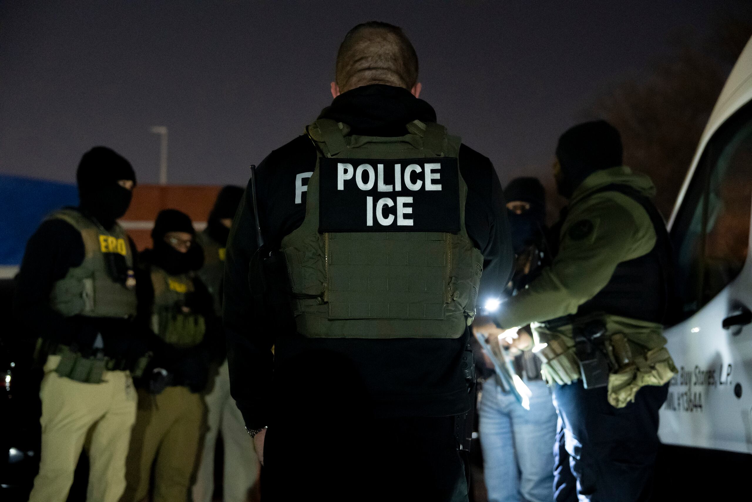 U.S. Immigration and Customs Enforcement officers gather for a briefing before an enforcement operation, Monday, Jan. 27, 2025, in Silver Spring, Md. (AP Photo/Alex Brandon)