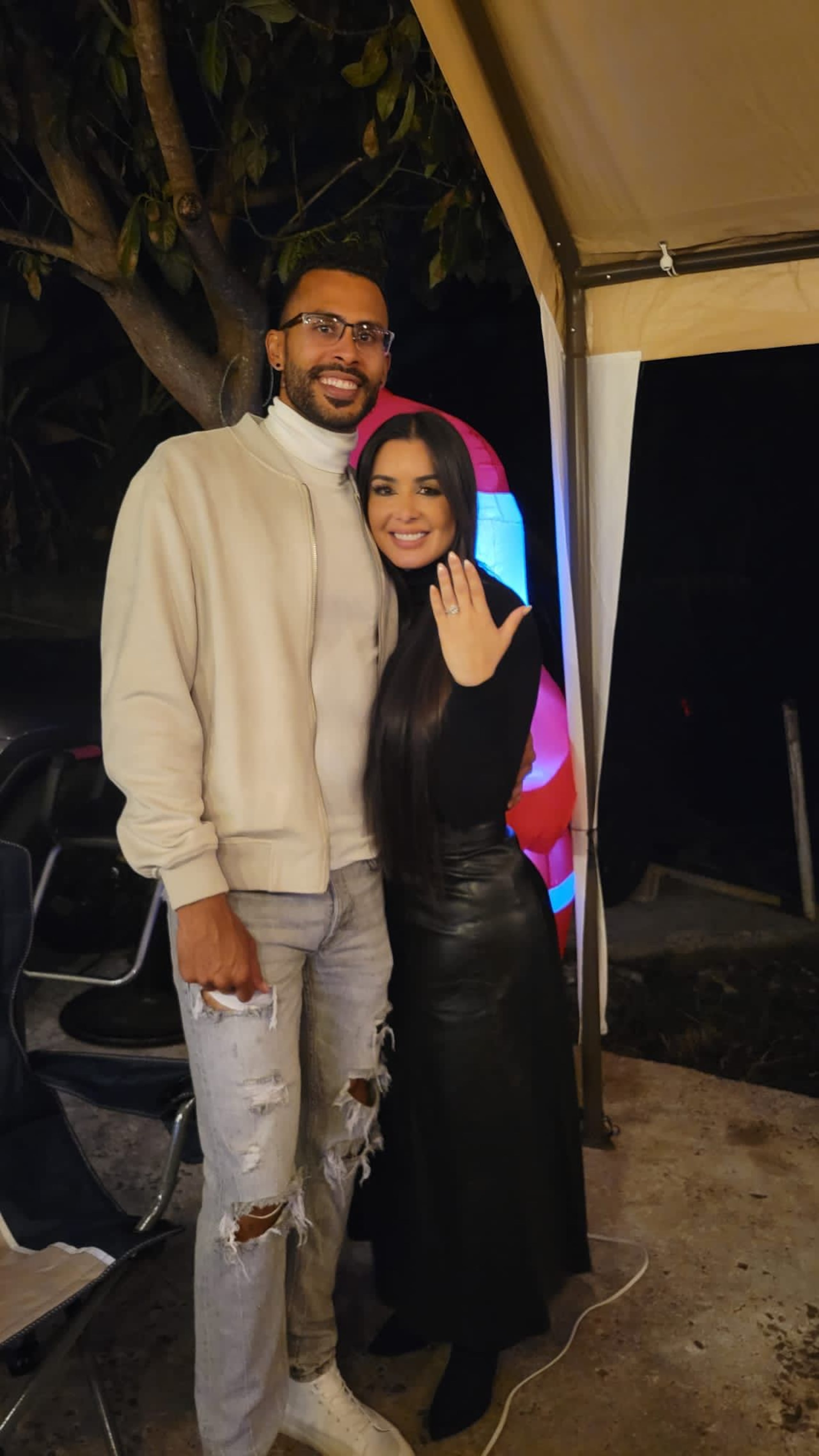La locutora radial Michelle López y su novio, el pelotero Yadiel Rivera.