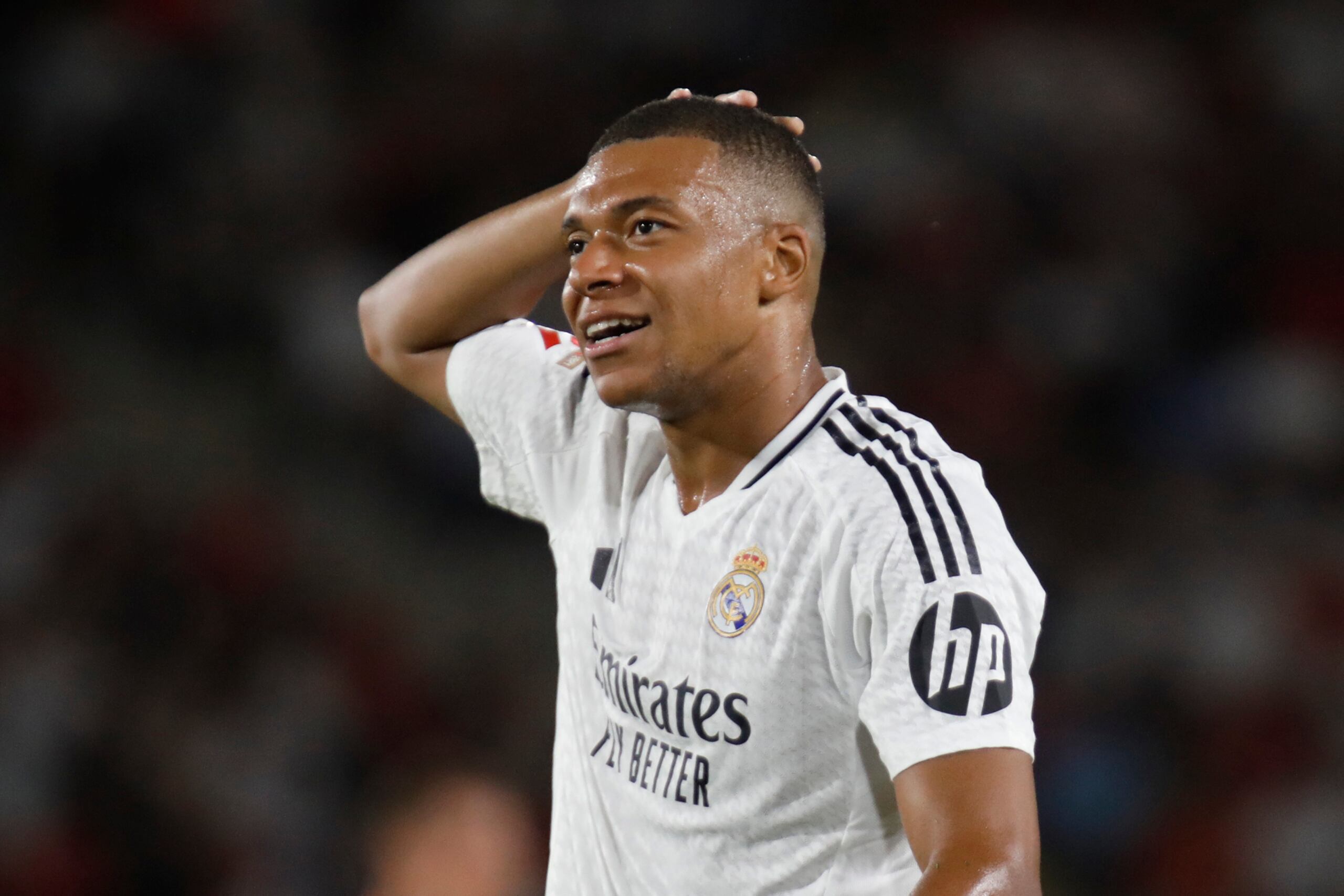 Kylian Mbappe del Real Madrid reacciona en el encuentro ante el Mallorca en la liga española el domingo 18 de agosto del 2024. (AP Foto/Francisco Ubilla)