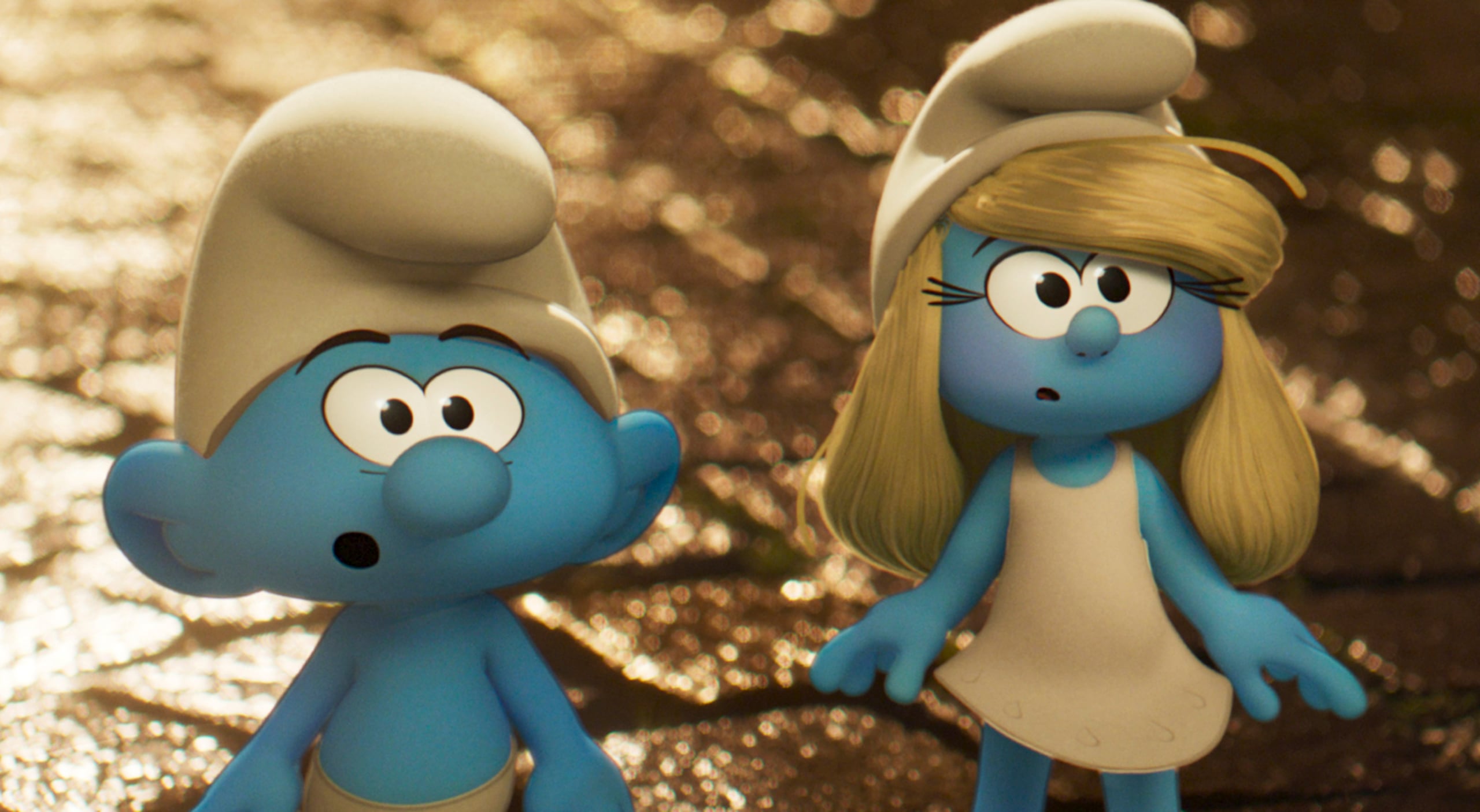 James Corden y Rihanna le dan voz a los personajes titulares de "Smurfs."