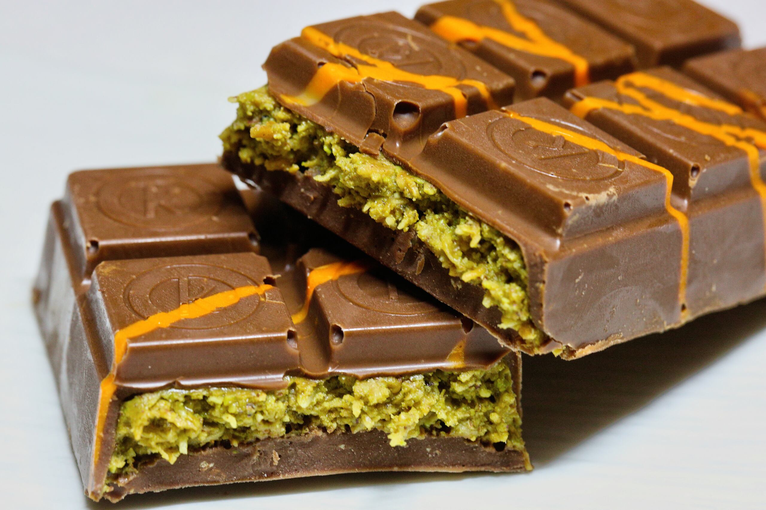 Dubai pistachio kunafa chocolate bars are displayed in Maple, Ontario, Canada, on May 11, 2025. The Dubai Pistachio Kunafa (kadayif) Chocolate combines creamy milk chocolate, crunchy kunafa, and rich pistachios. (Photo by Creative Touch Imaging Ltd./NurPhoto) (Photo by Creative Touch Imaging Ltd / NurPhoto / NurPhoto via AFP)