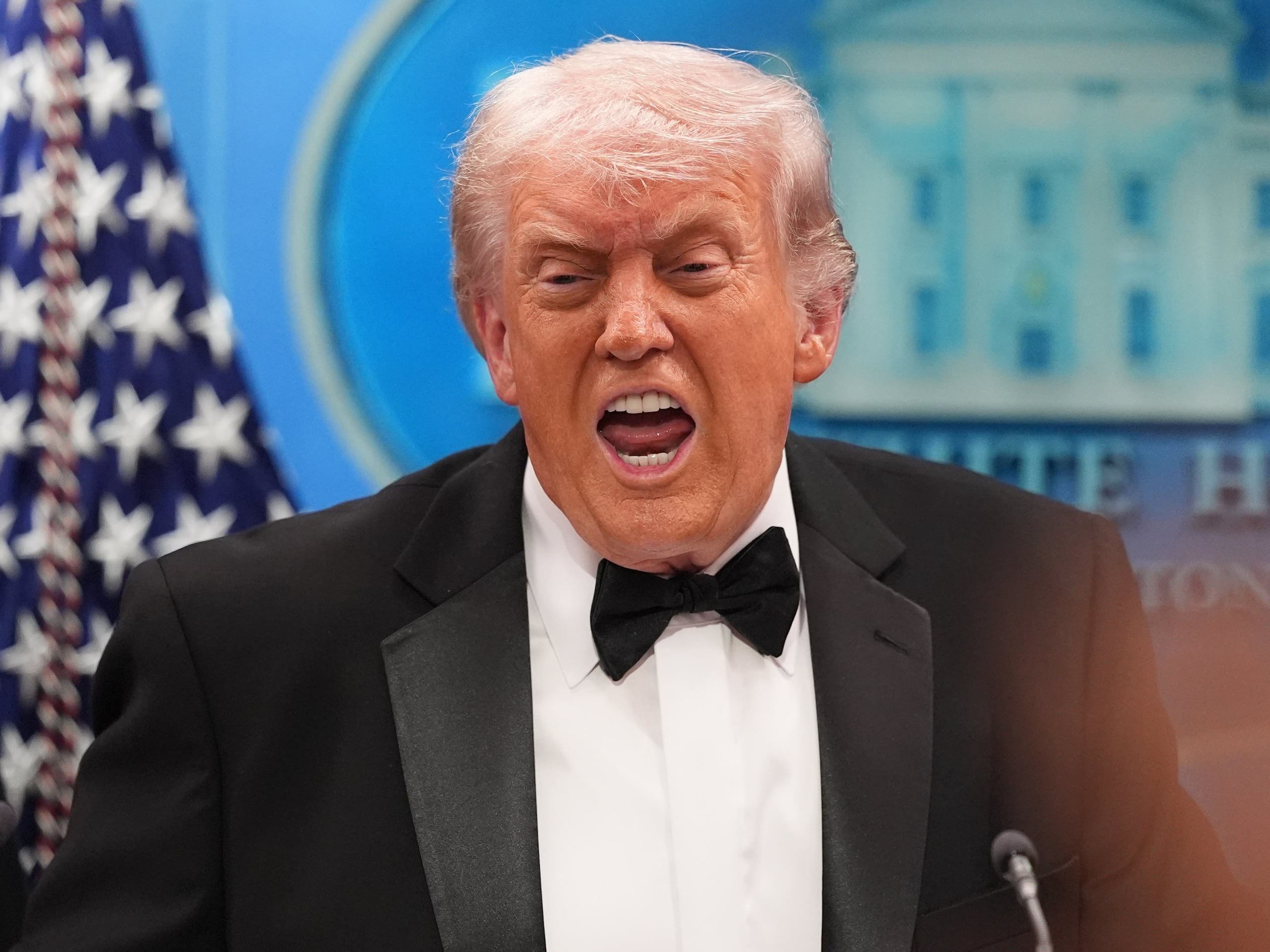 President Donald Trump speaks in the James Brady Press Briefing Room at the White House after an unspecified threat at the annual White House Correspondents' Association Dinner in Washington, Saturday, April 25, 2026, as acting Attorney General Todd Blanche and FBI director Kash Patel listen. (AP Photo/Alex Brandon)