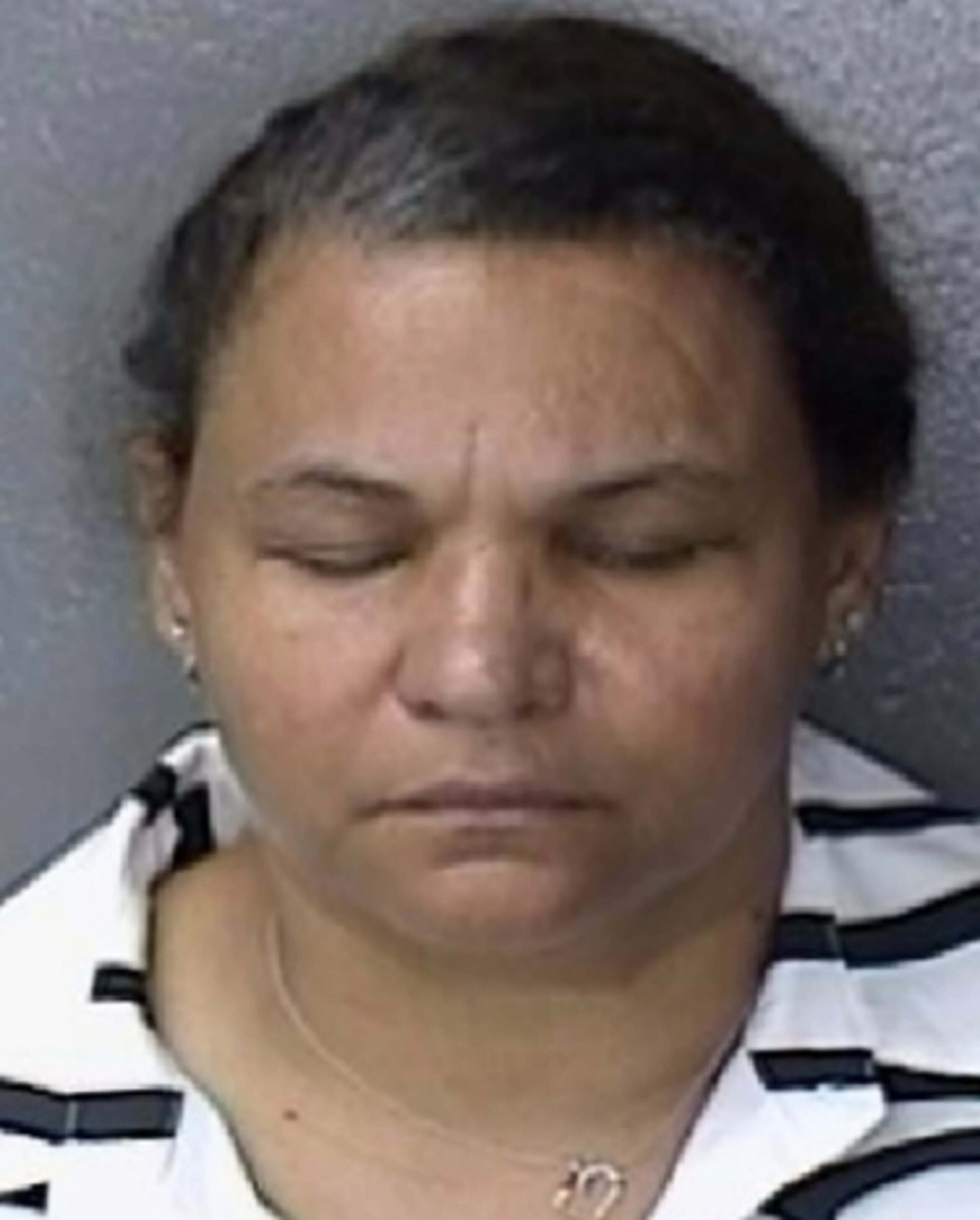 Ficha policíaca de la imputada, Maritza Cruz Méndez, de 50 años y residente de Río Grande.