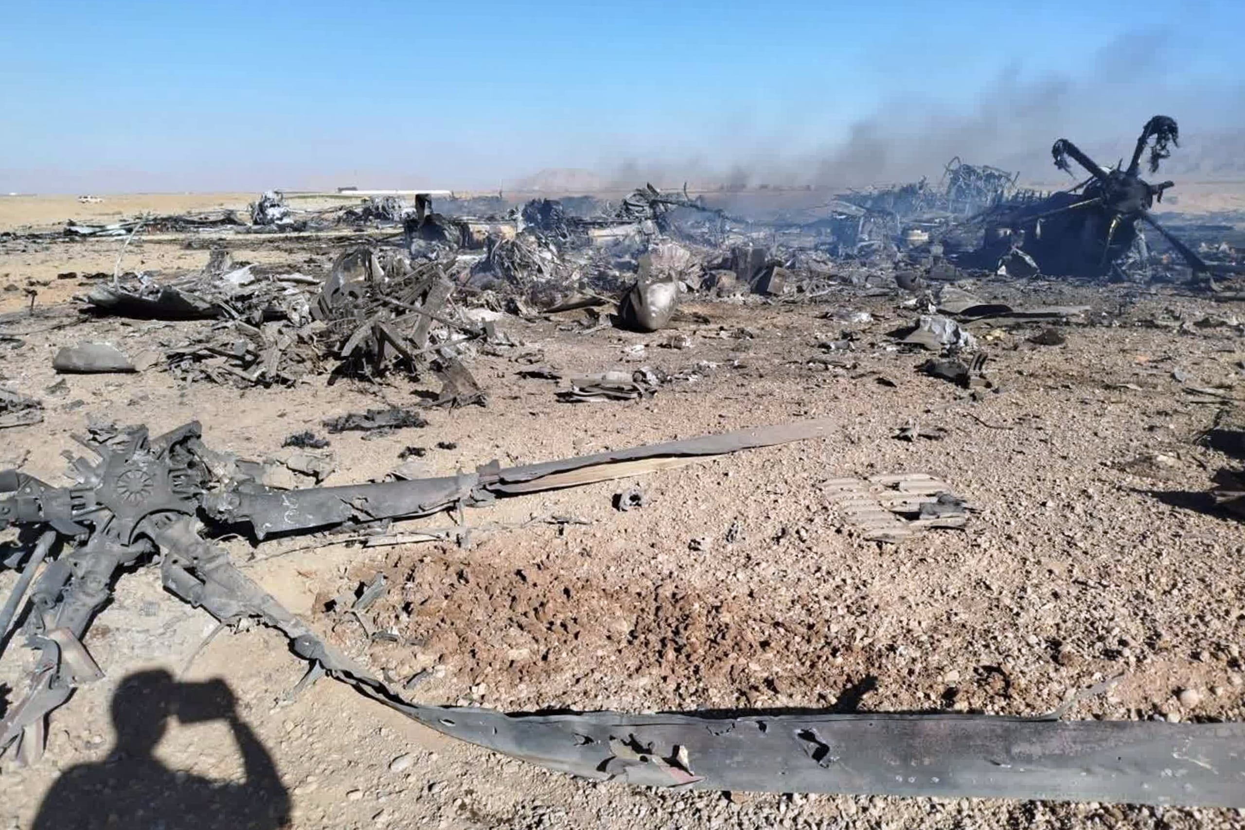 In this image provided by Sepahnews, the Iranian Revolutionary Guard's official website, wreckage is shown at what Iran's state TV claimed was the site of a downed American transport plane and two helicopters involved in a rescue operation, in Isfahan province, Iran, April, 2026. (Sepahnews via AP)