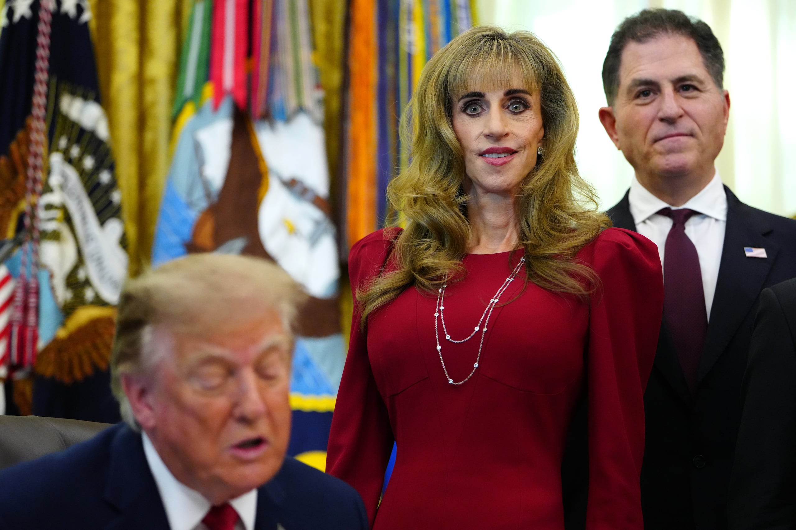Michael y Susan Dell junto al presidente Donald Trump.