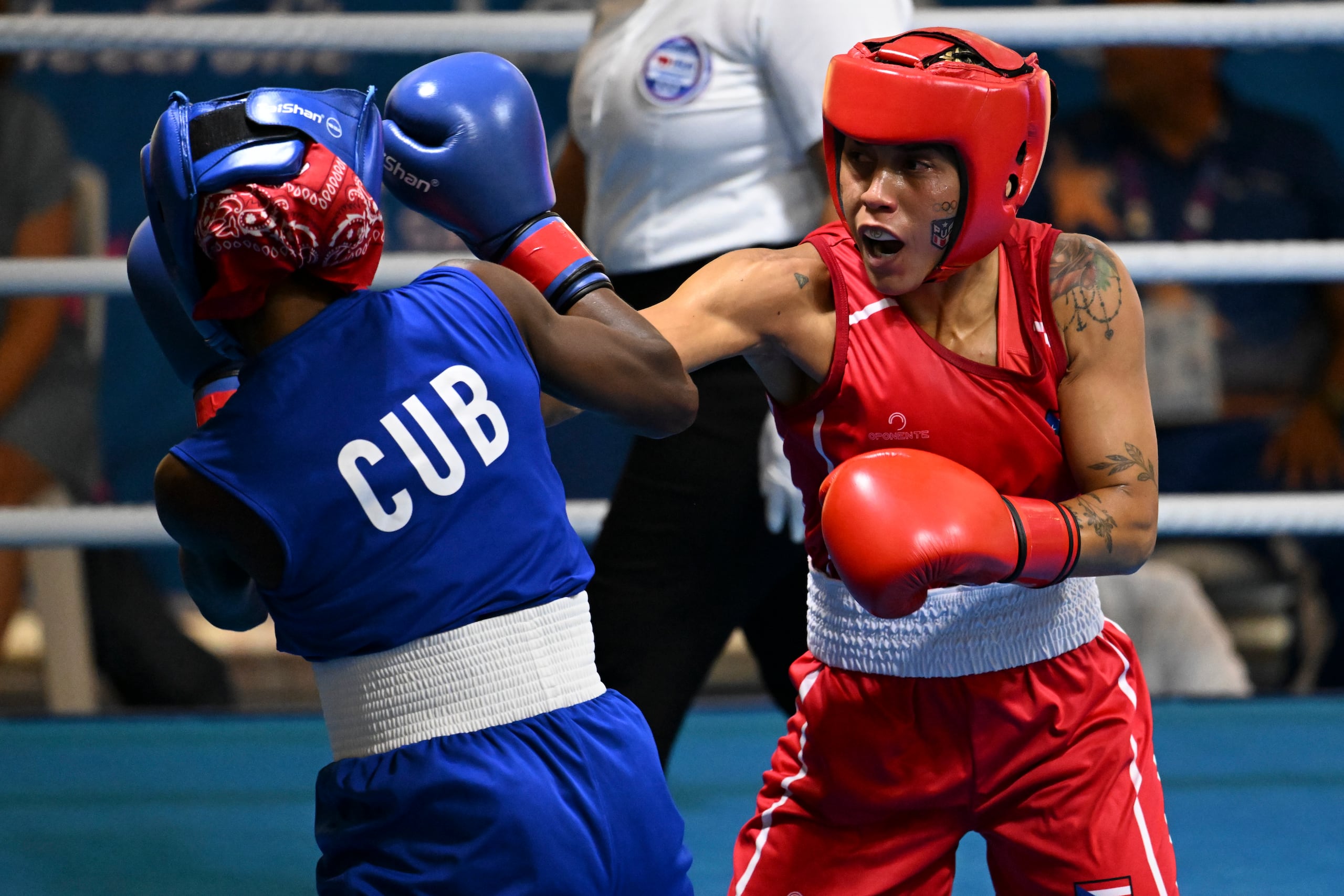 Asheyann Lozada (derecha) es una de las tres féminas que representarán a Puerto Rico en los Juegos Panamericanos 2023.