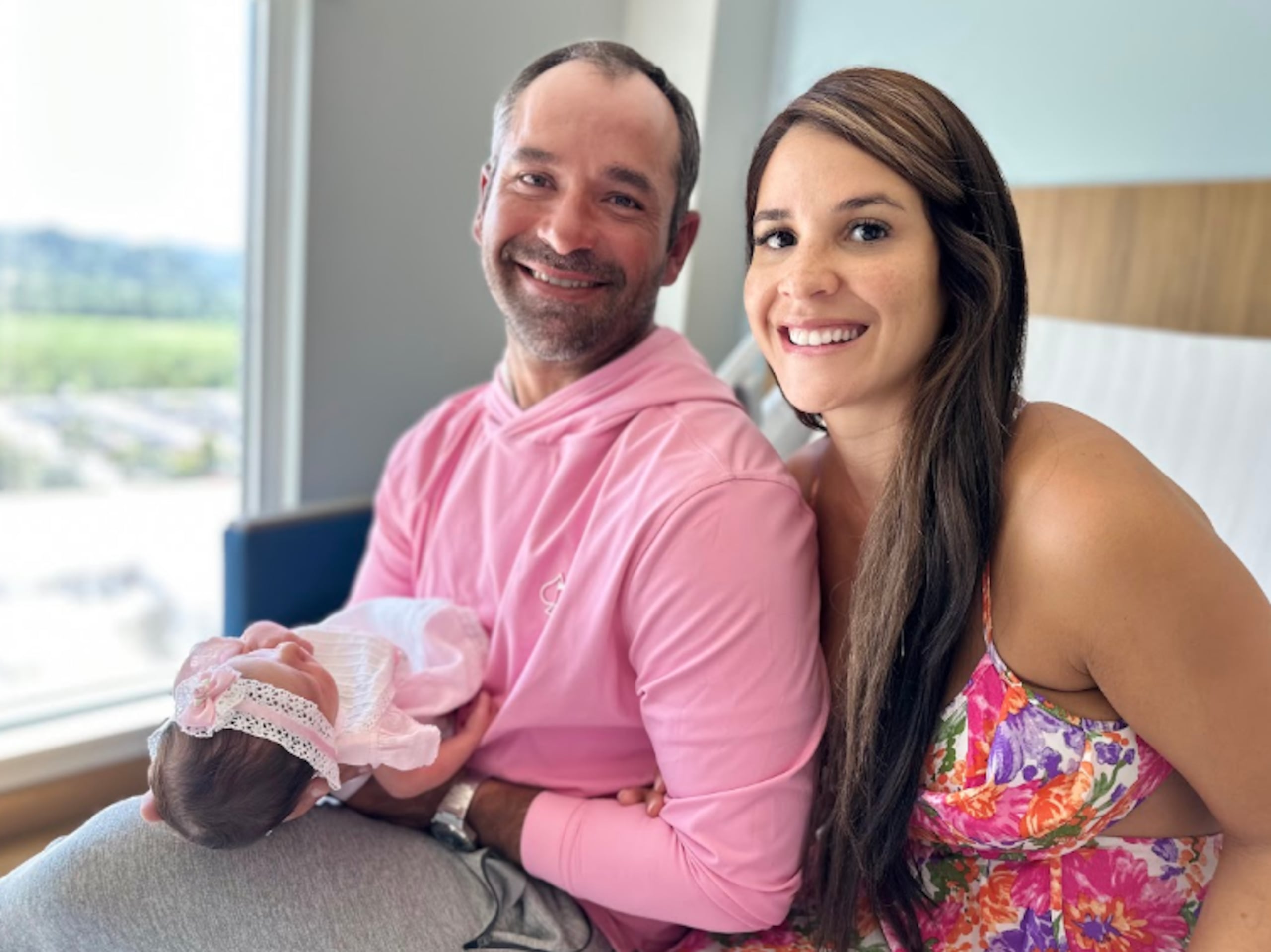 El golfista junto a su familia.