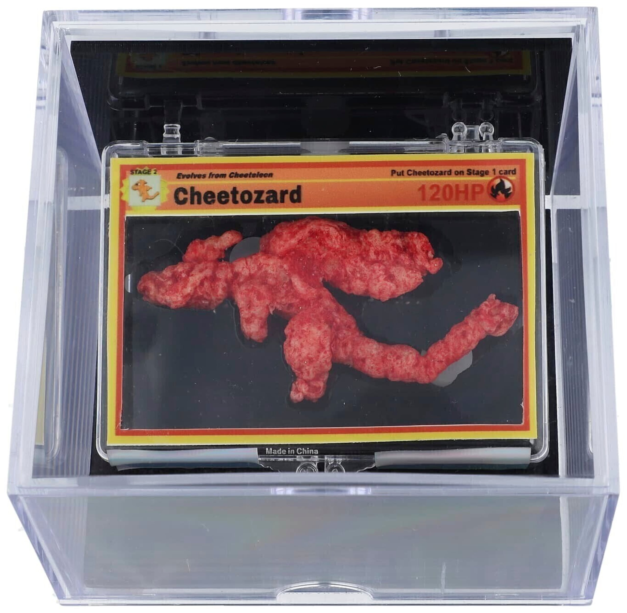 Esta foto sin fecha facilitada por Goldin Auctions muestra un Cheeto con forma del Pokémon Charizard que se ha subastado por 87,840 dólares. (Goldin Auctionsvia AP)