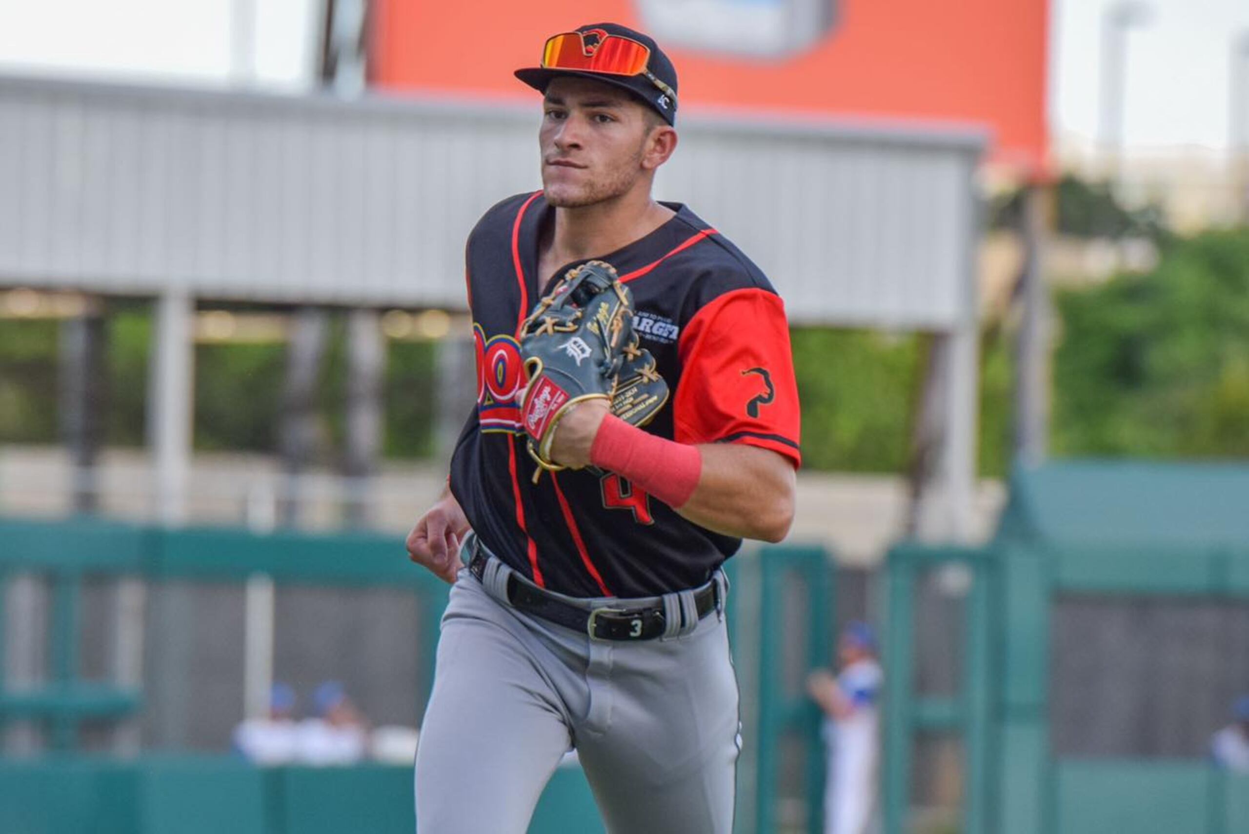 Trei Cruz en uniforme de los Leones.