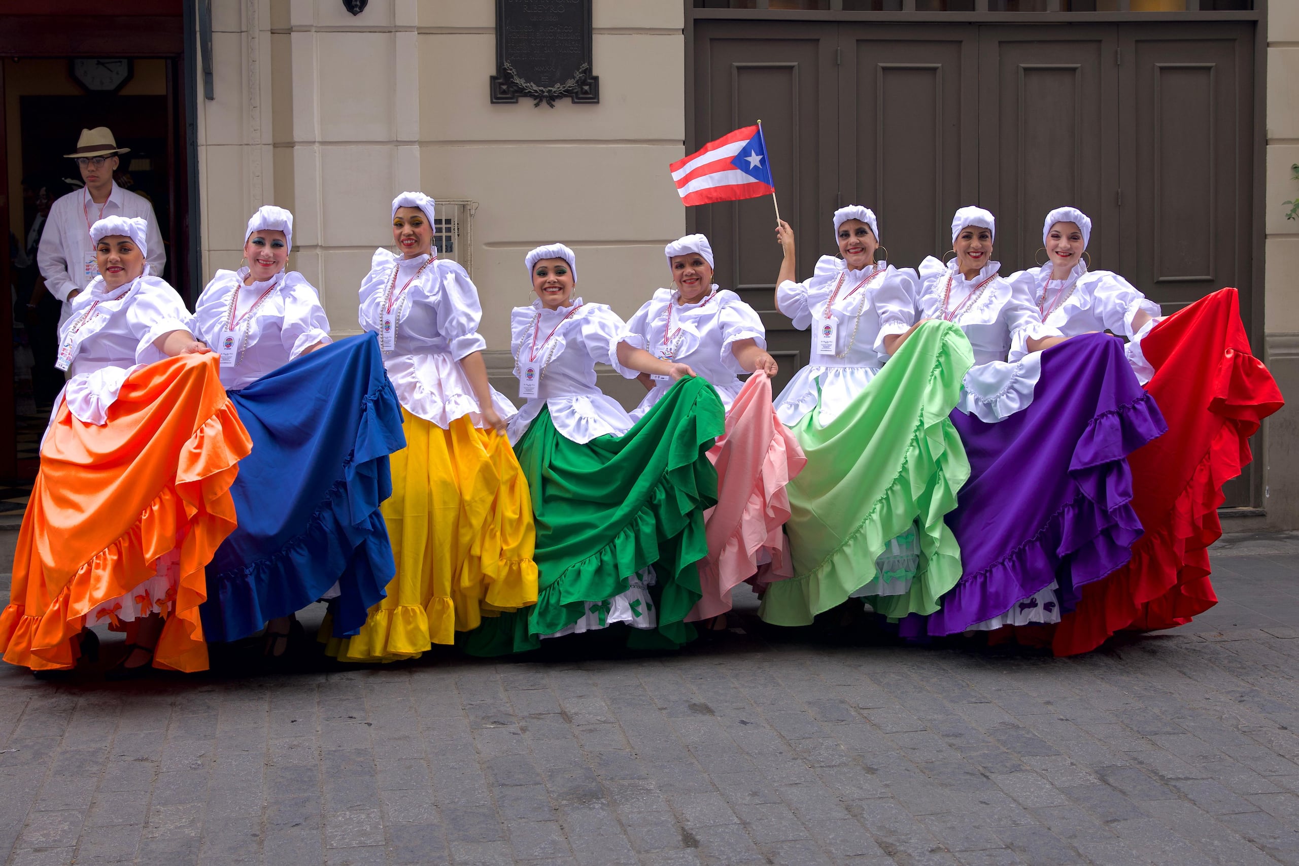 Bailarinas y músicos boricuas representan por primera vez a la Isla en el festival folclórico de la capital peruana.