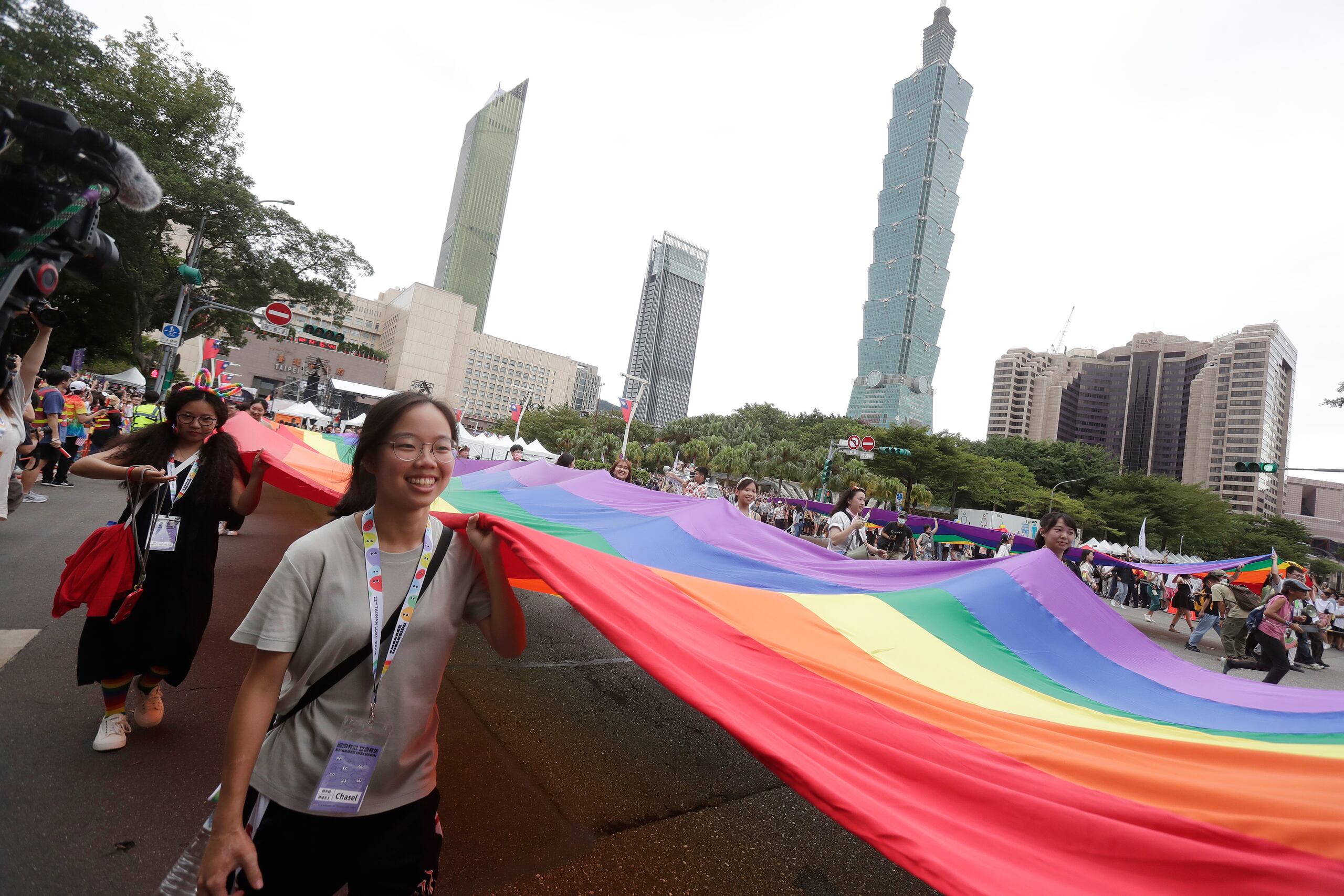 Participants revel through a street during the annual Taiwan LGBT Pride parade in Taipei, Taiwan, Saturday, Oct. 26, 2024. (AP Photo/Chiang Ying-ying)