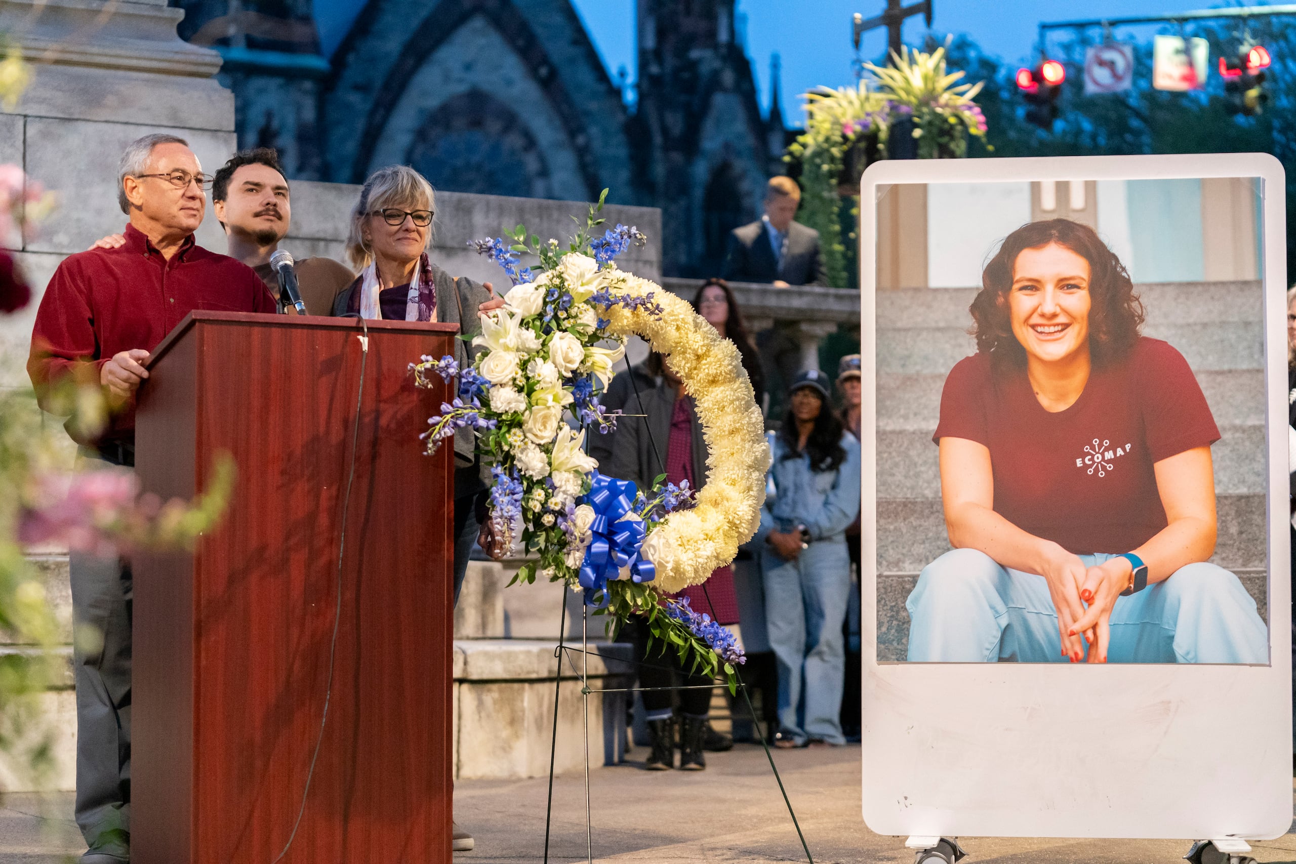 Frank LaPere, Nico LaPere and Caroline Frank, the family of Pava LaPere, founder of tech startup EcoMap Technologies, speak during a vigil on Wednesday, Sept. 27, 2023, in Baltimore. Loved ones are remembering the slain Baltimore tech entrepreneur for her compassion and dedication to helping others. Baltimore police found 26-year-old Pava LaPere dead from blunt force trauma in her apartment complex after she was reported missing late Monday morning. (AP Photo/Stephanie Scarbrough)