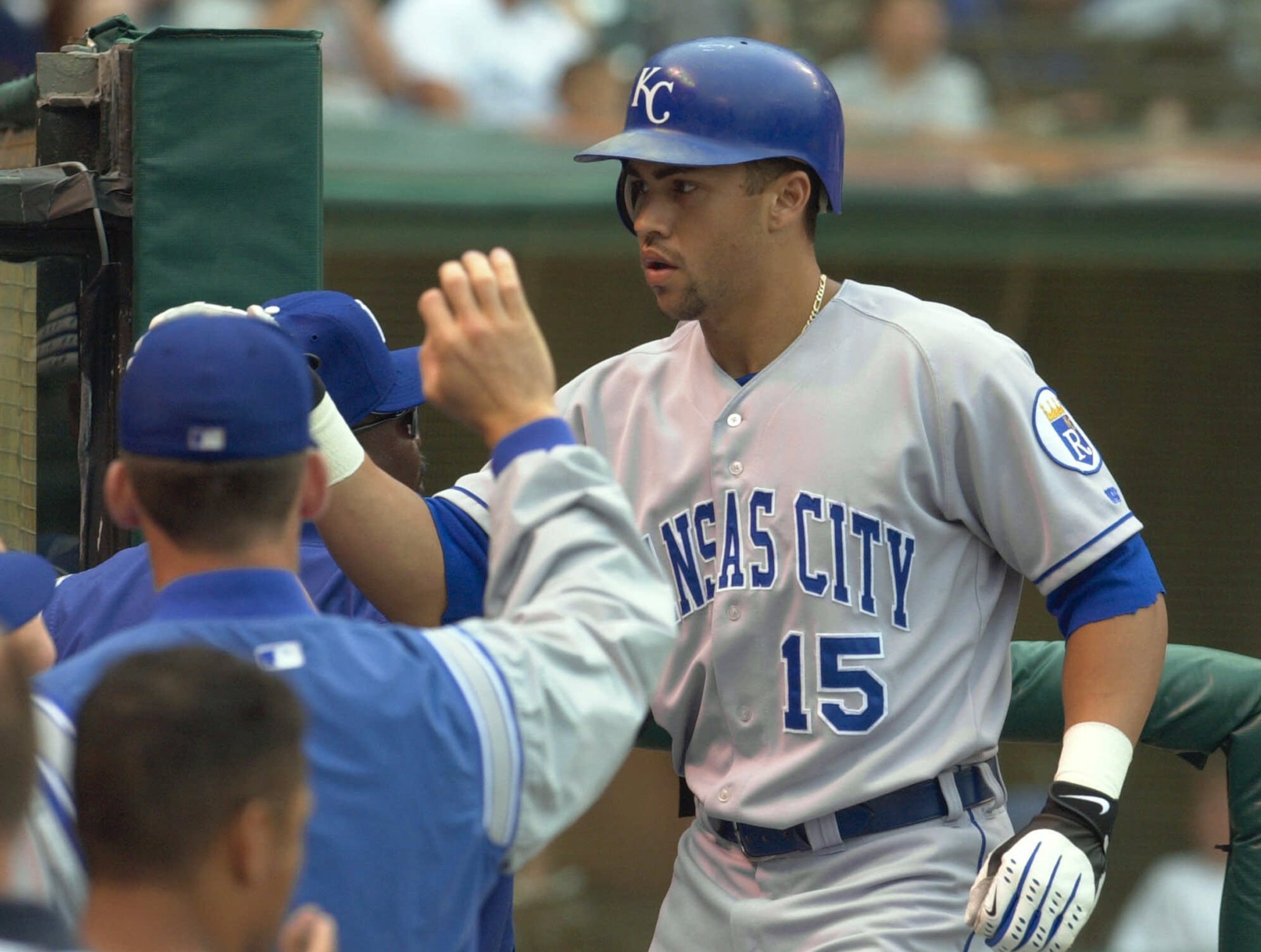 Kansas City Royals Carlos Beltran (15) is greeted at the dugout after his two-run homer off Cleveland Indians reliever Roy Smith in the fourth inning Sunday, July 1, 2001, in Cleveland. Beltran has homer in all three games of the series in Cleveland so far. (AP Photo/Mark Duncan)