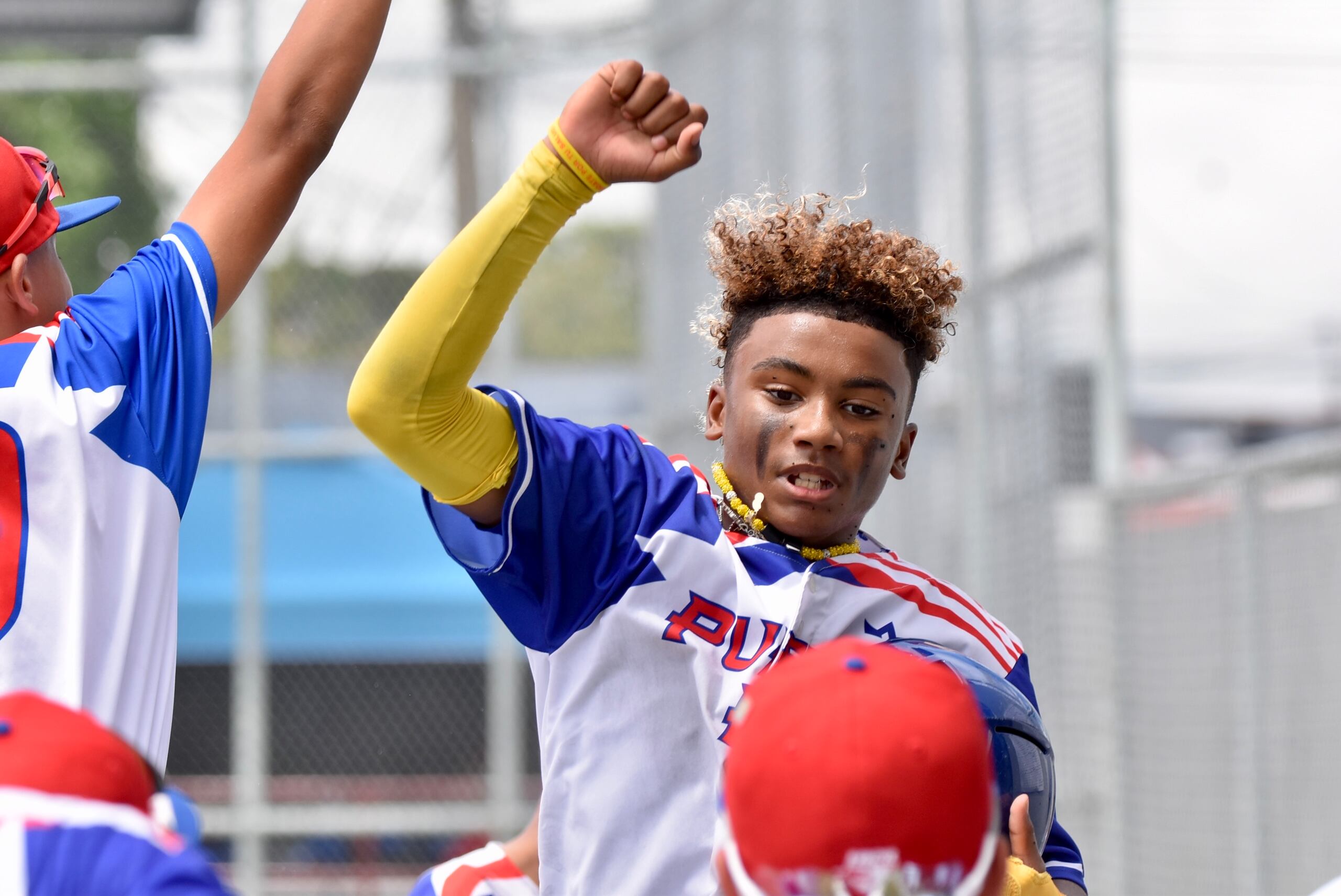 Jayden Richardson marca una de las carreras de los boricuas en el partido.