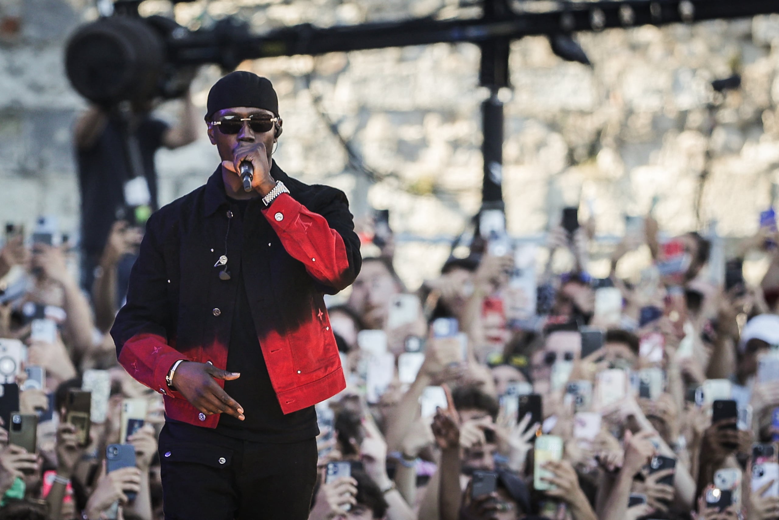 Werenoi performs on stage during the 40th edition of the Francofolies de La Rochelle music festival, in La Rochelle, southwestern France, on July 13, 2024. (Photo by Thibaud MORITZ / AFP)