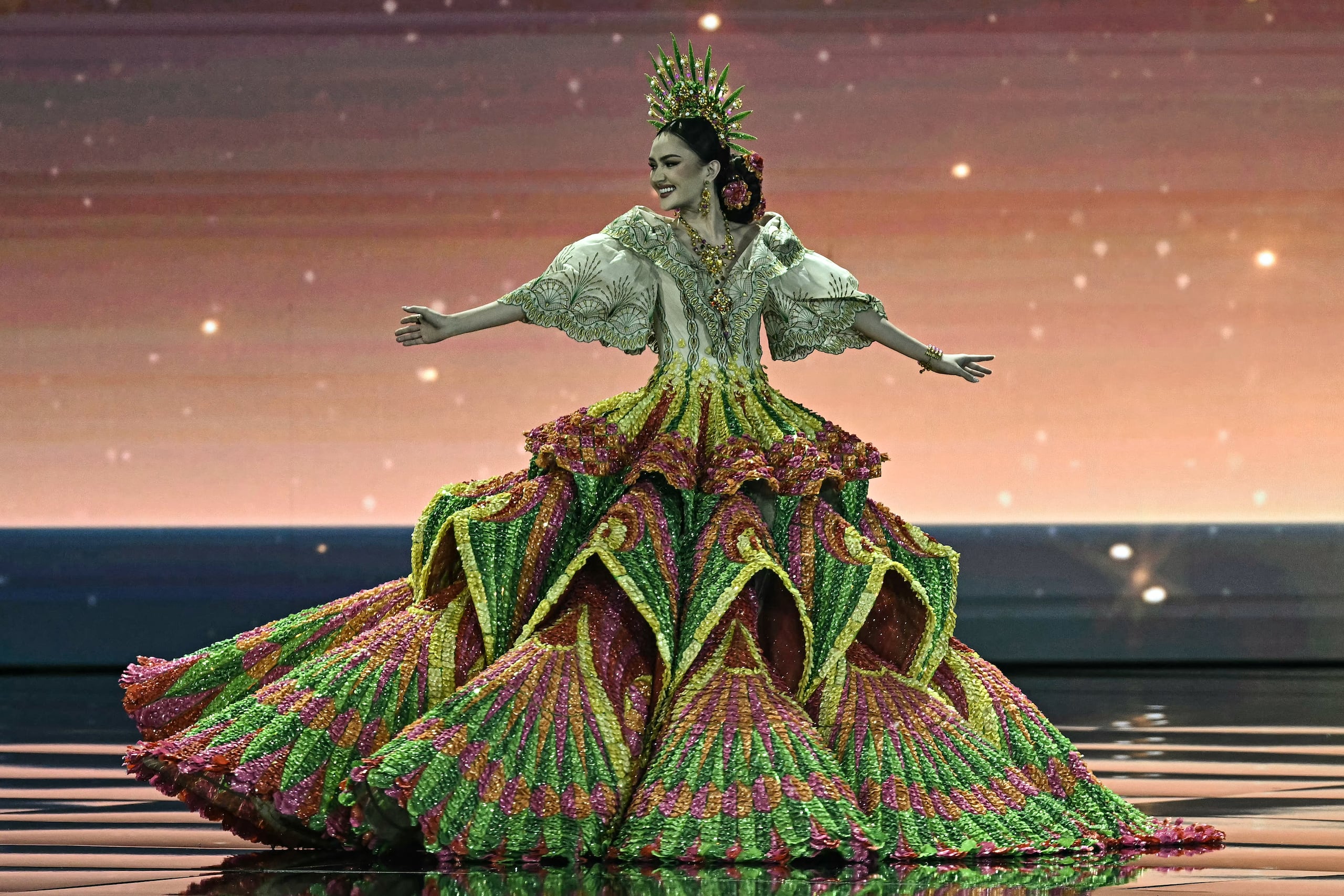 Miss Philippines Ahtisa Manalo walks on stage during the 2025 Miss Universe national costume presentation in Nonthaburi province, north of Bangkok on November 19, 2025. (Photo by Lillian SUWANRUMPHA / AFP)