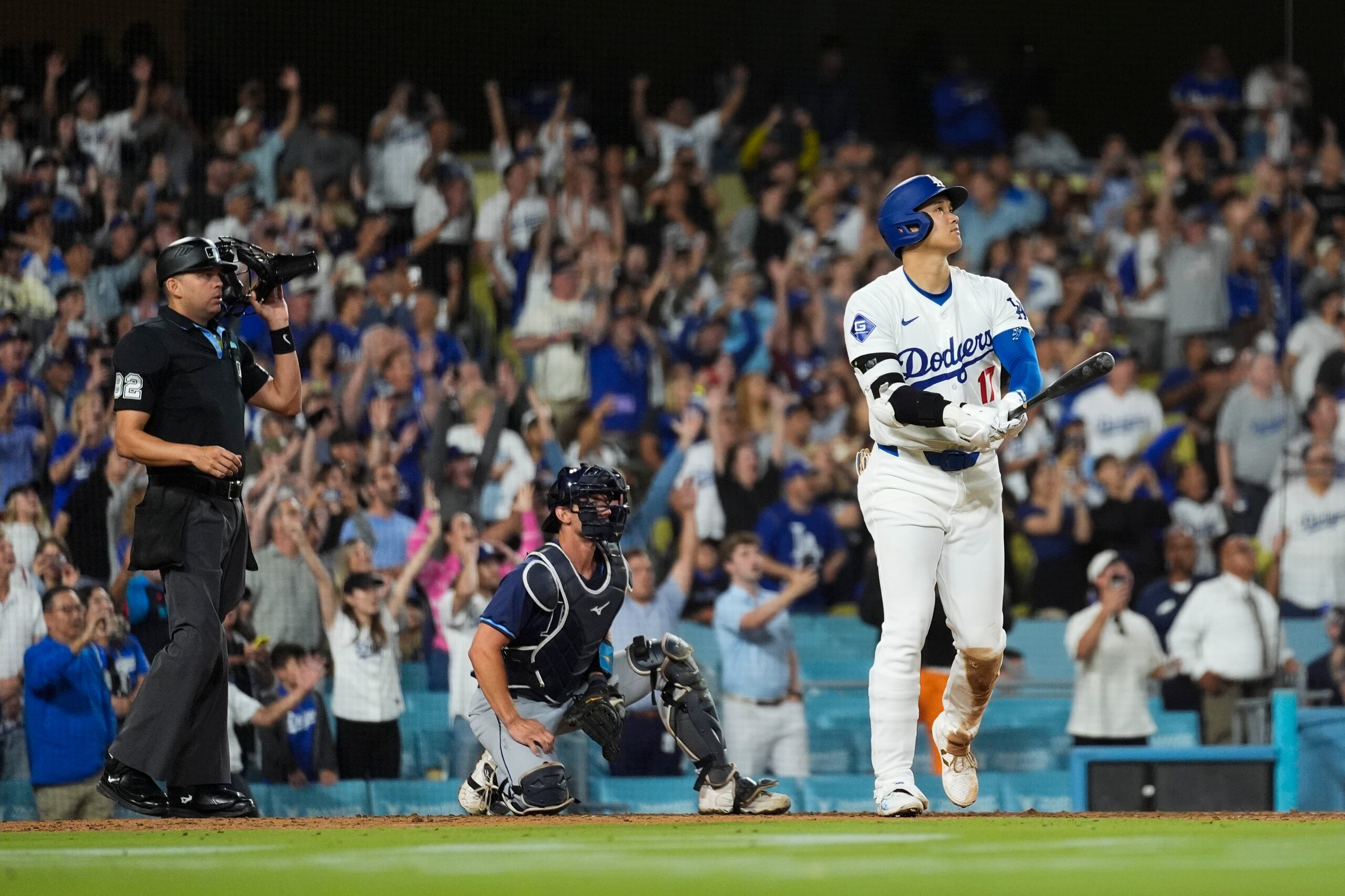 El japonés Shohei Ohtani, bateador designado de los Dodgers de Los Ángeles, conecta un grand slam para resolver el encuentro del viernes 23 de agosto de 2024 ante los Rays de Tampa Bay. Al momento suma 40 HR y 40 bases robadas esta campaña. Nadie en la historia ha llegado a 50 y 50.