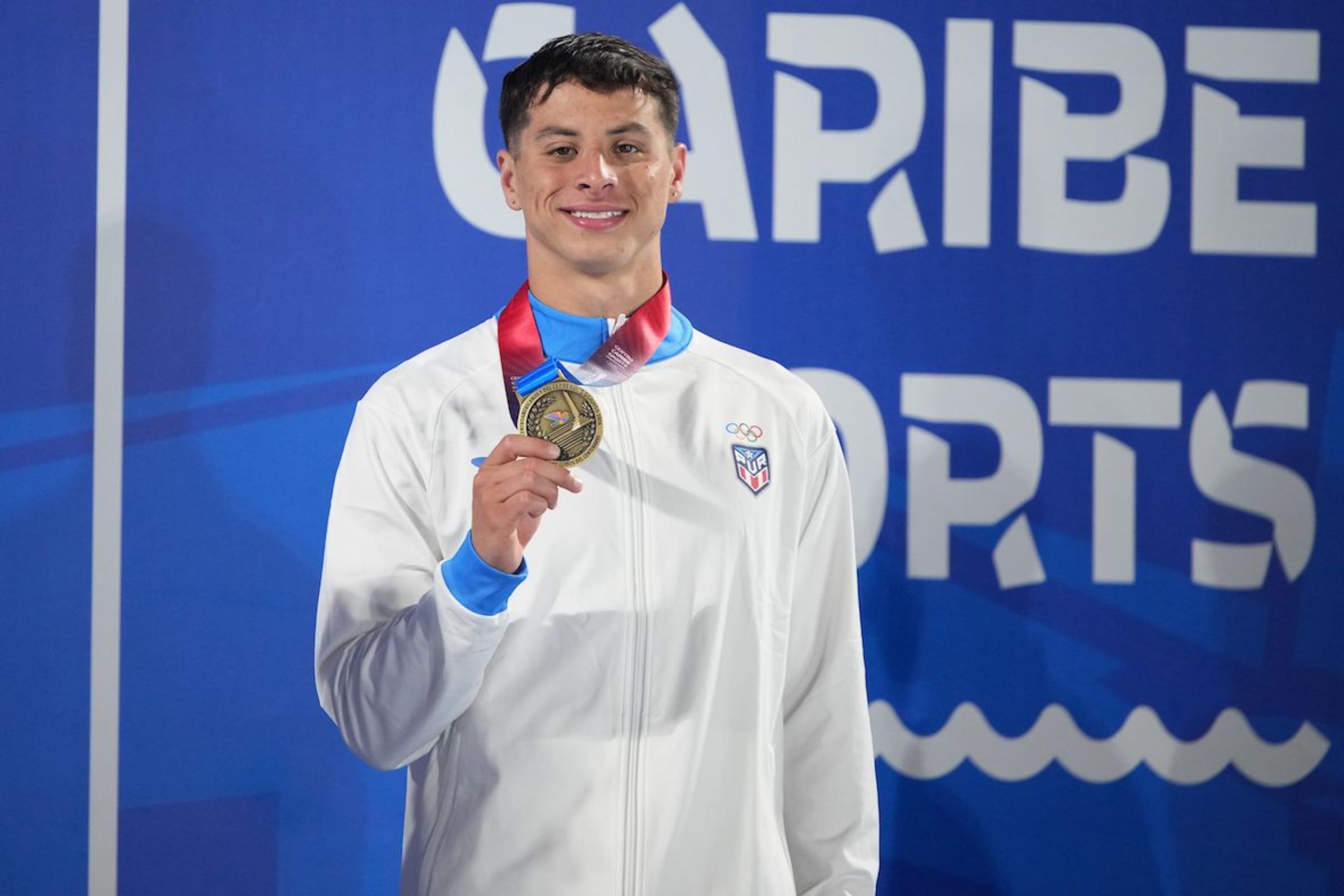 Javier Ruiz ganó oro en 100 metros pecho. (Copur)