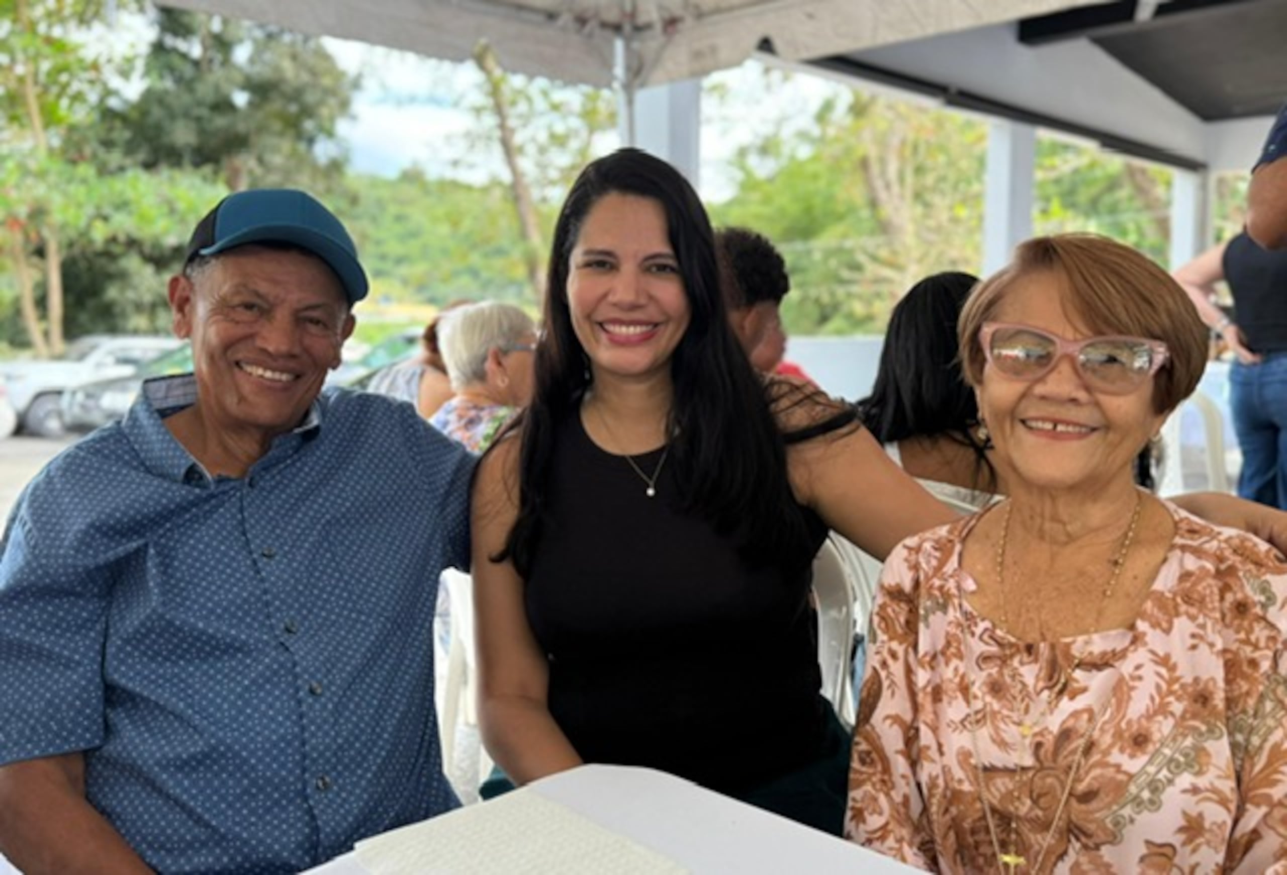 Doraliz E. Ortiz y sus padres