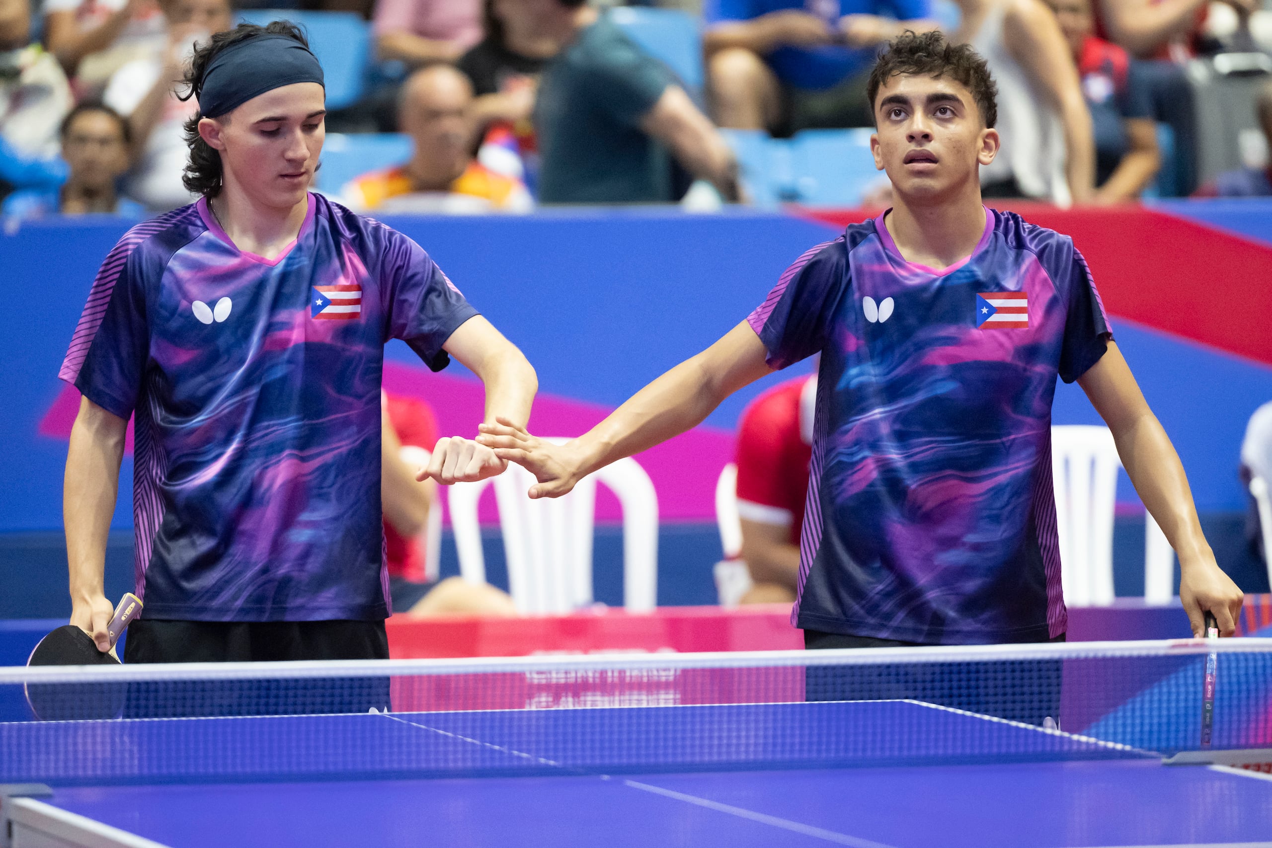 Steven Moreno y Enrique Ríos, dos de los tres boricuas que adelantaron de ronda en el tenis de mesa, junto con Ángel Naranjo.