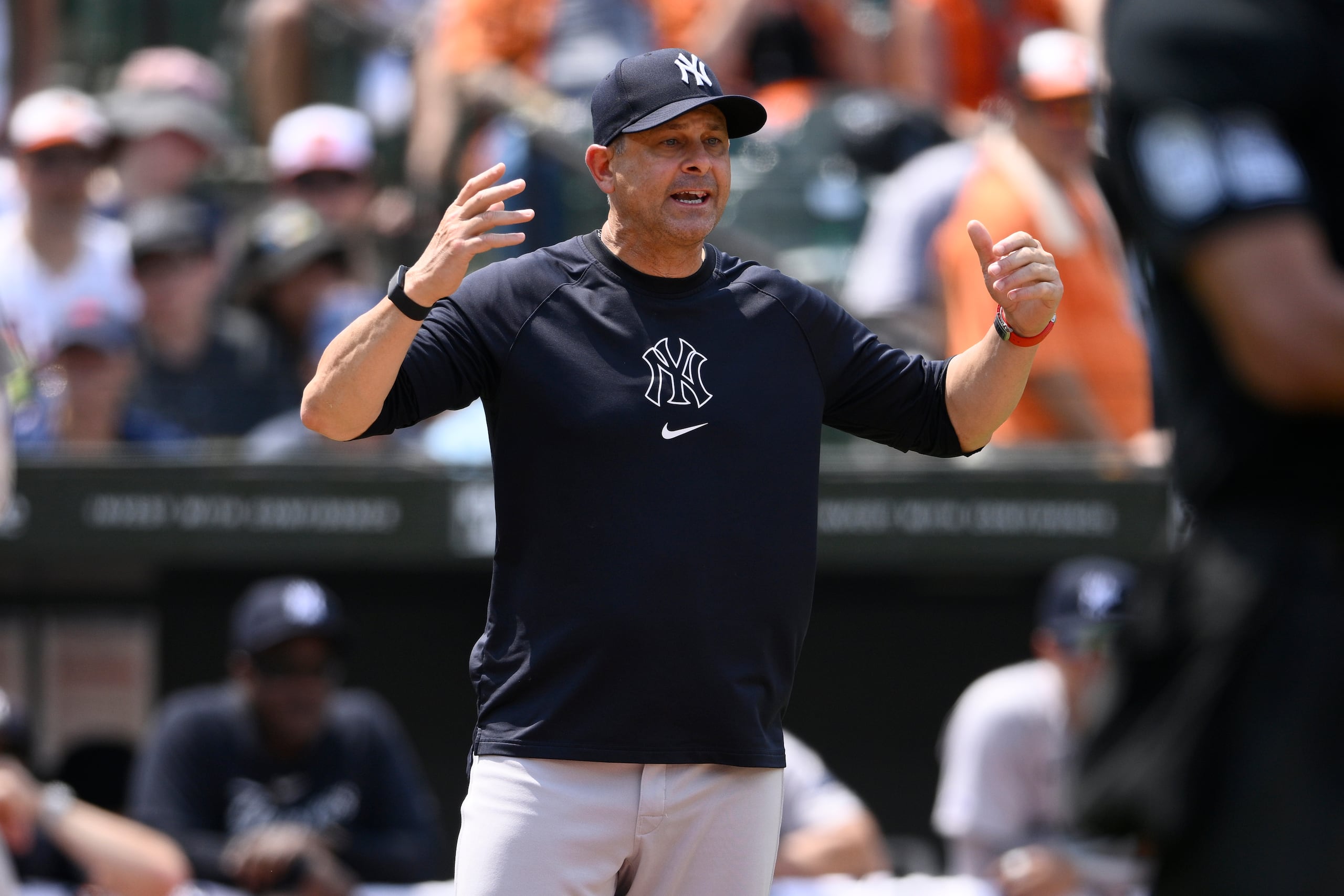 New York Yankees manager Aaron Boone gestures on the field during the ninth inning of a baseball game against the Baltimore Orioles, Sunday, July 14, 2024, in Baltimore. (AP Photo/Nick Wass)