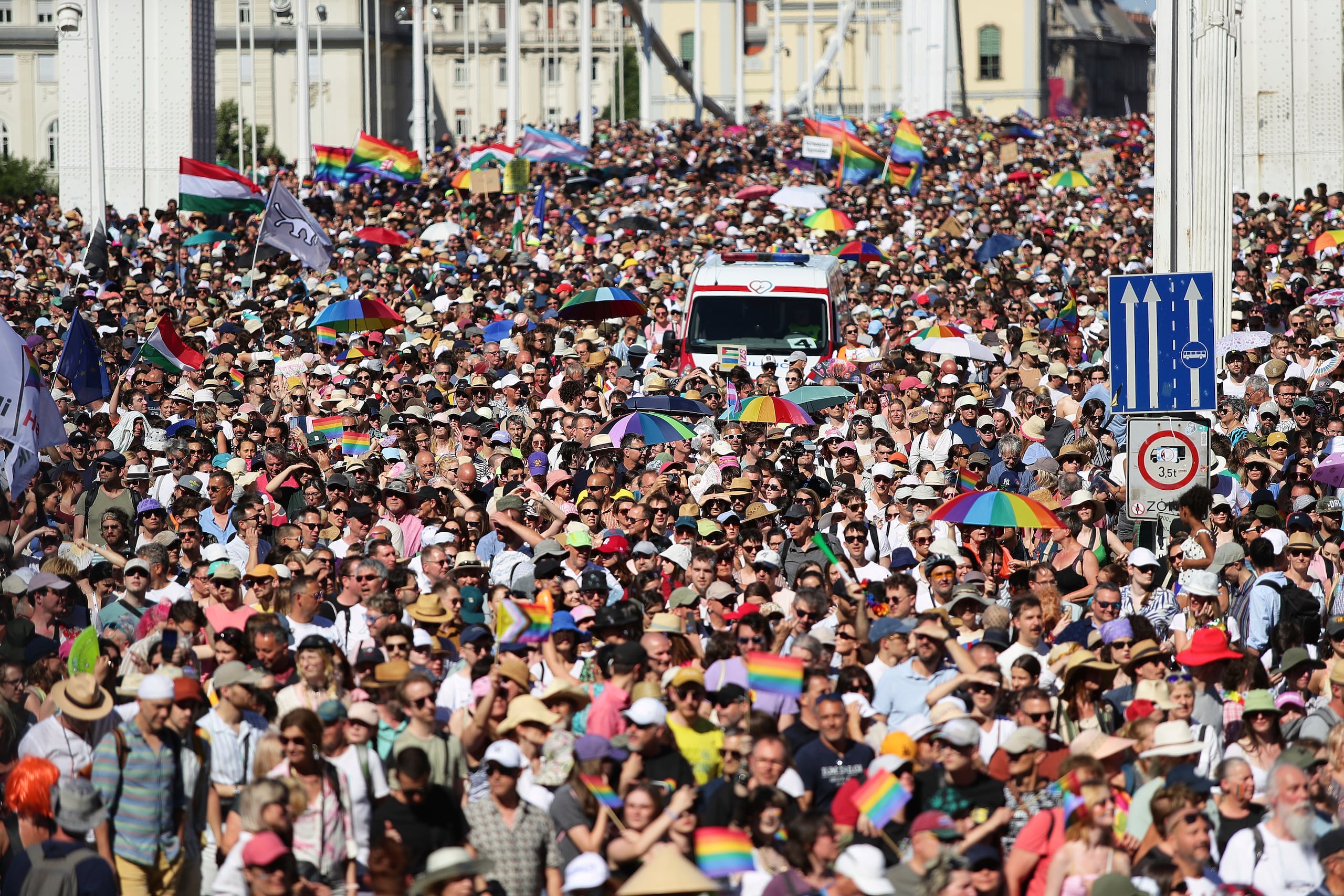 Participants in the Pride march cross the Elisabeth Bridge in Budapest, Hungary, Saturday, June 28, 2025. (AP Photo/Rudolf Karancsi)
