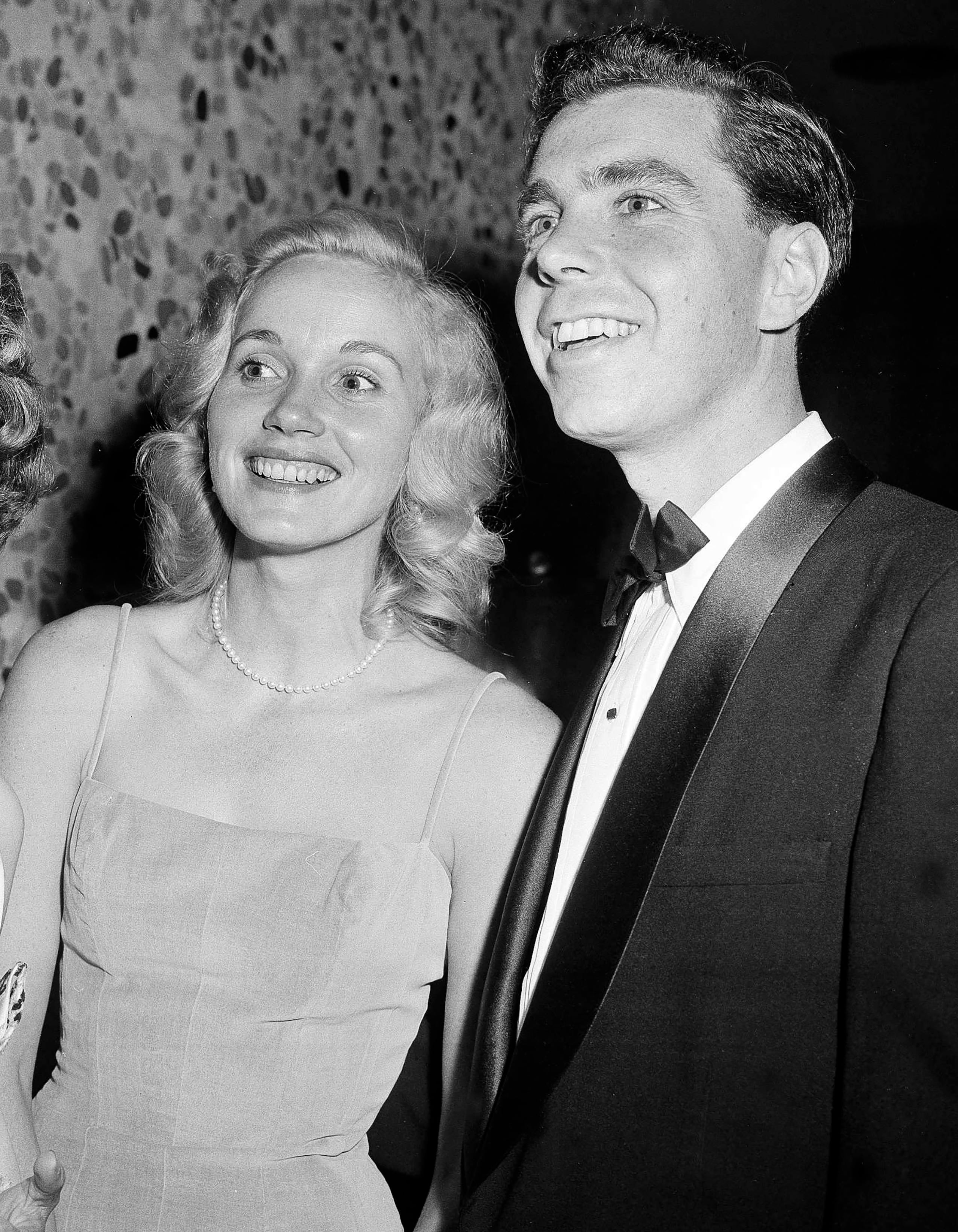 FILE - Eva Marie Saint, left, and Jeffrey Hayden the annual Motion Picture Costumers ball on Oct. 25, 1957, in Los Angeles. (AP Photo/Harold P. Matosian, File)