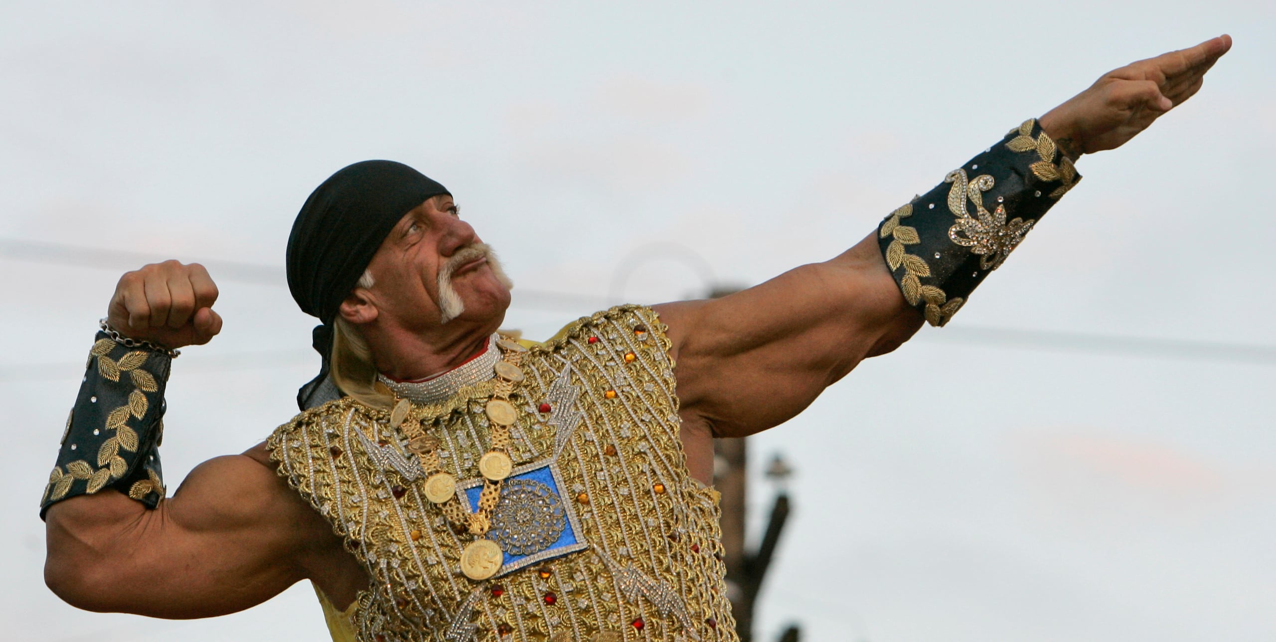FILE - Actor Hulk Hogan poses on his float during the Krewe of Bacchus Mardi Gras parade in New Orlean, Feb. 3, 2008, the weekend before Fat Tuesday. (AP Photo/Alex Brandon, File)