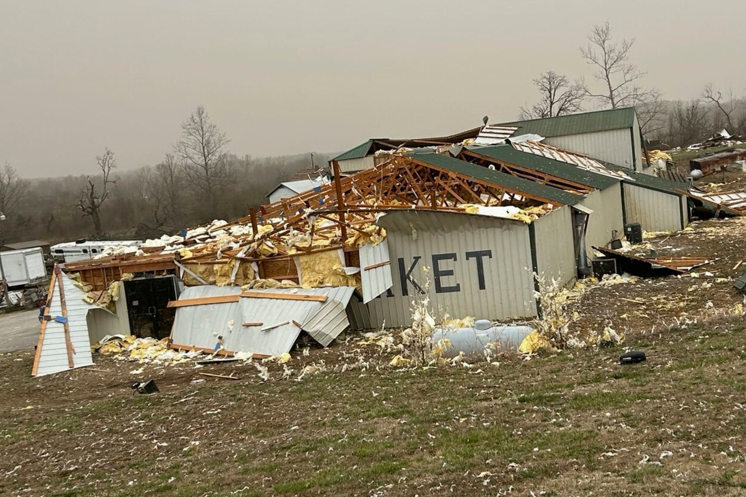 In this photo provided by Missouri State Highway Patrol, a home is damaged after a severe storm passed the area near Ozark County, Mo., early Saturday, March 15, 2025.  (Missouri State Highway Patrol via AP)