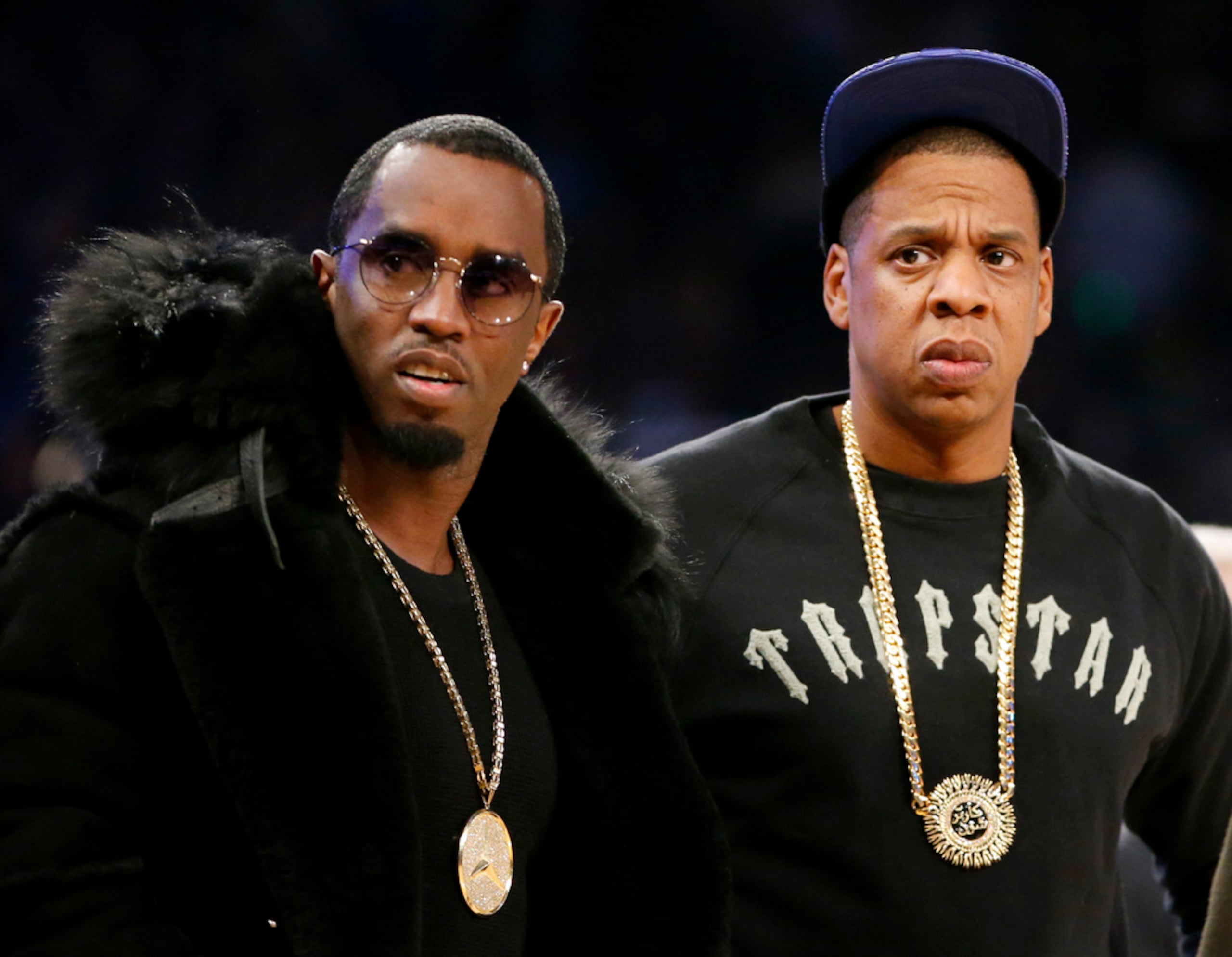 Los magnates del rap Sean "Diddy" Combs y Jay-Z en un partido de baloncesto All-Star de la NBA, el 15 de febrero de 2015, en Nueva York.