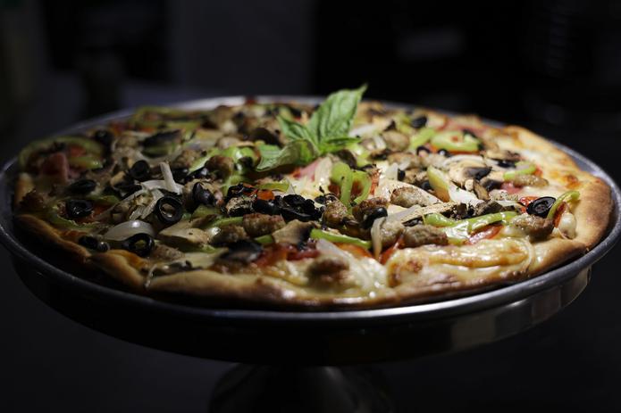Las pizzas de la Trattoria Italiana son famosas en el área.