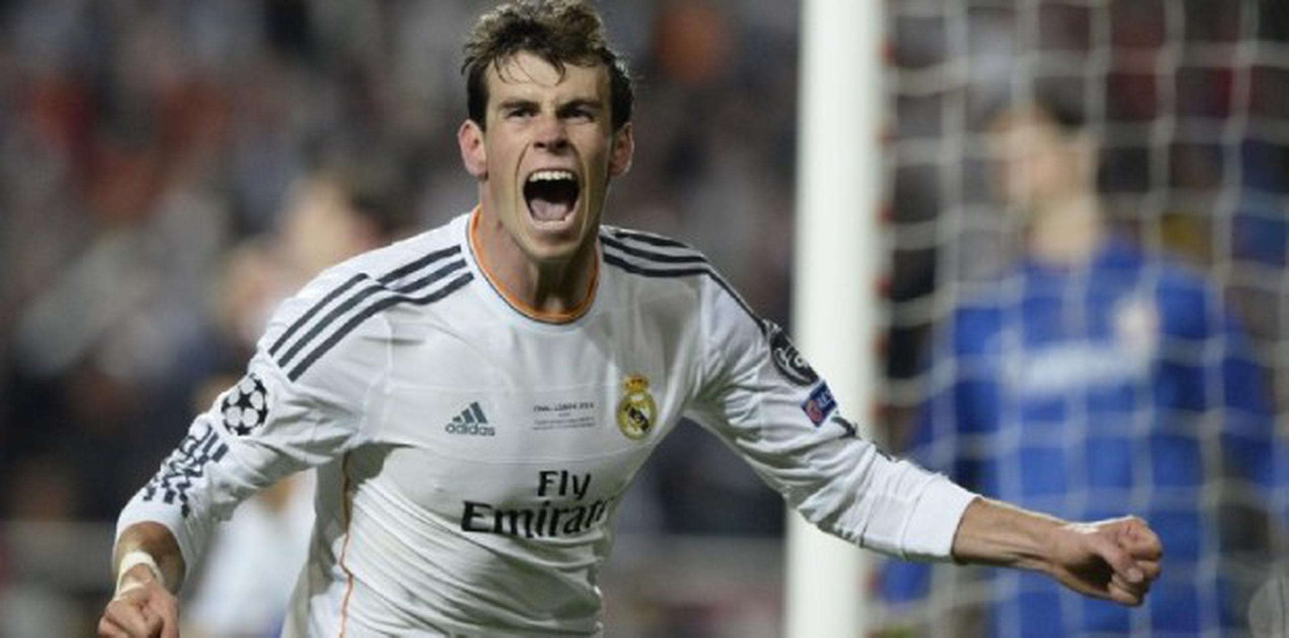 El delantero del Real Madrid, Gareth Bale, celebra luego de anotar en el tiempo extra  (AFP / Franck Fife)