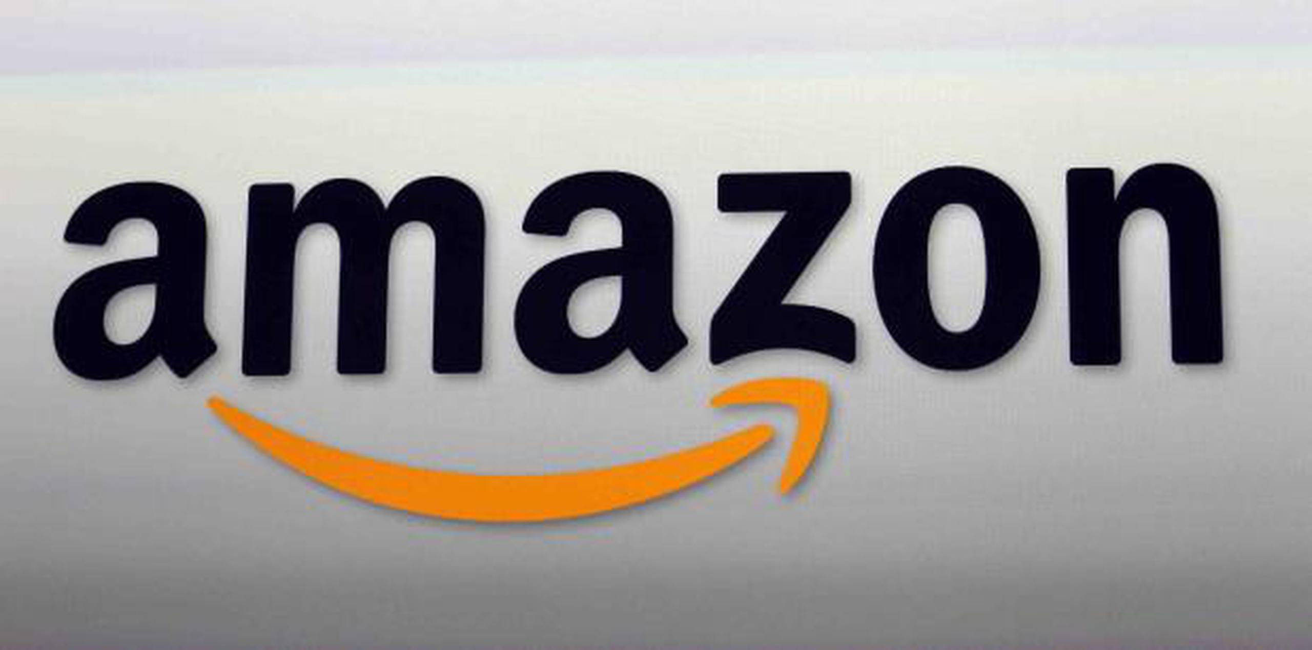 En el último año, Amazon dijo que ha ascendido a unos 19,000 empleados que empacaban y enviaban órdenes a puestos de gerente o supervisor. (AP / Reed Saxon)