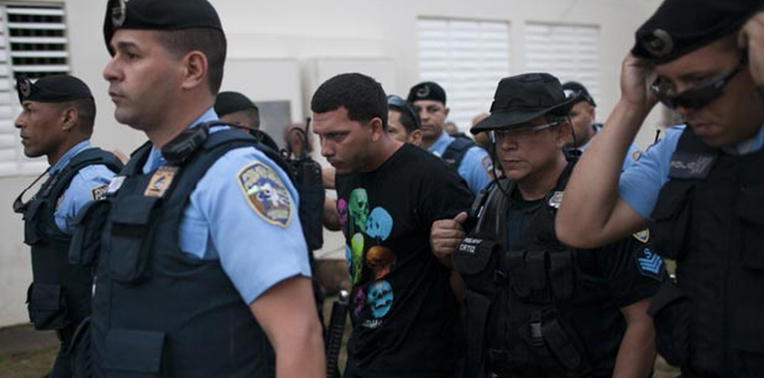 Jonathan Rodríguez Ruiz, conocido como Sapo, tenía varias órdenes de arresto por tres asesinatos que se le imputan. (GFR/ Dennis M. Rivera Pichardo)