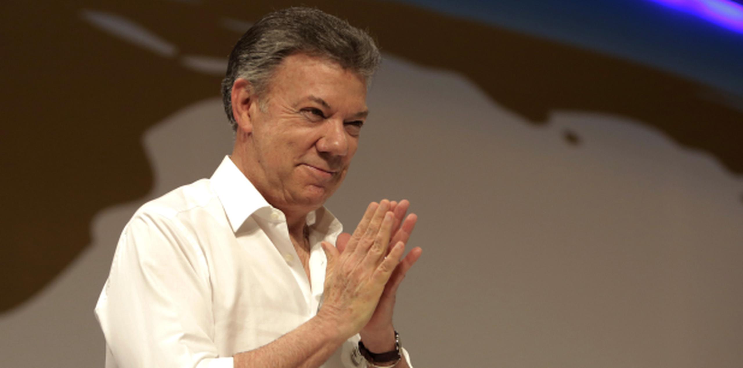 El presidente colombiano Juan Manuel Santos aseguró que el acuerdo logrado con un inversionista permitirá rescatar el pecio con la mejor tecnología disponible. (EFE/RICARDO MALDONADO ROZO)
